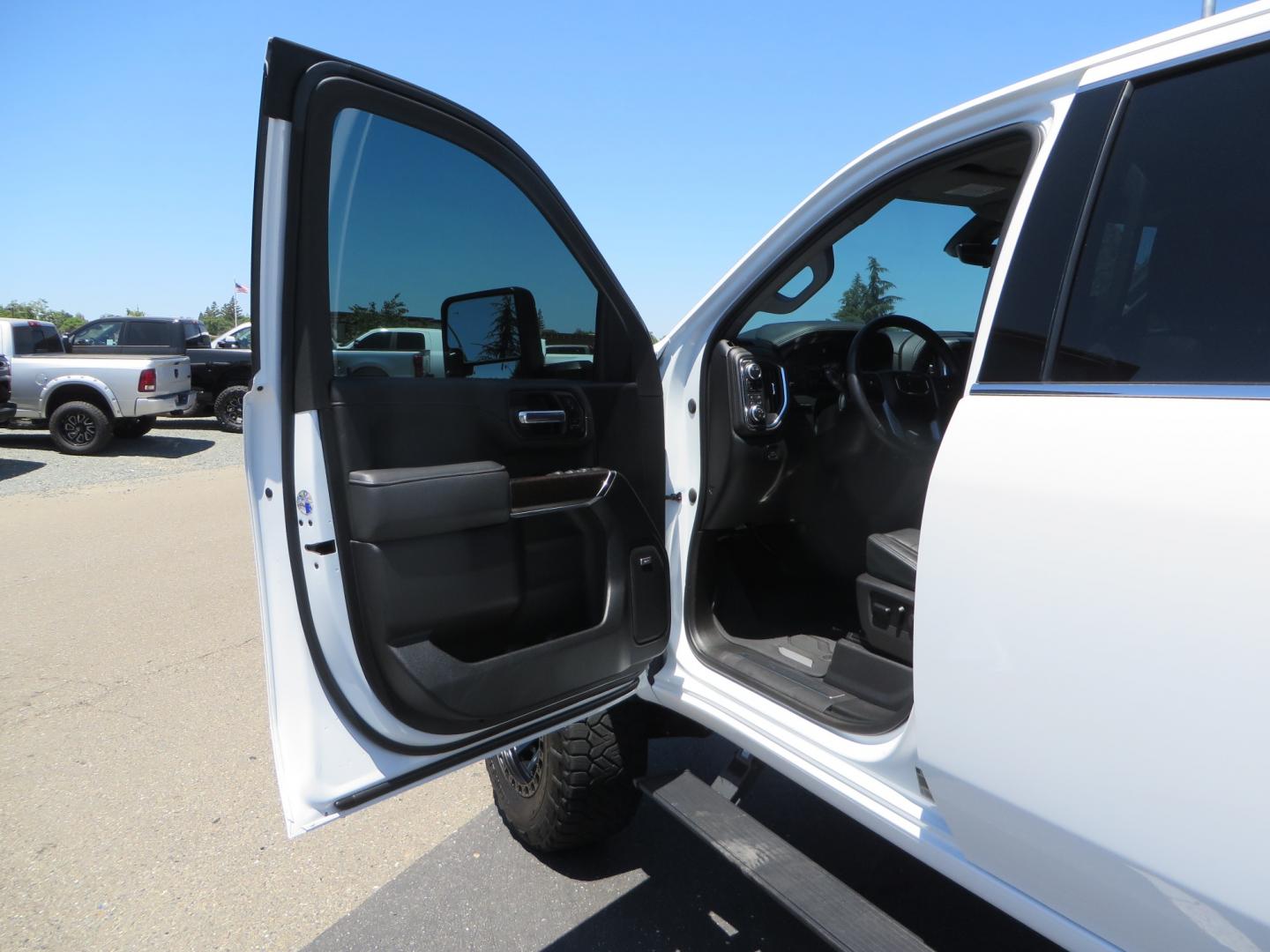 2021 White /black GMC Sierra 3500HD Denali (1GT49WEYXMF) with an 6.6L V8 TURBO DIESEL engine, automatic transmission, located at 2630 Grass Valley Highway, Auburn, CA, 95603, (530) 508-5100, 38.937893, -121.095482 - Must see Duramax with a ton of extras.... Cognito Suspension, Fox 2.0 remote reservoir shocks, 37" Nitto Recon Grappler tires, 20" Fuel Covert wheels, Sintor front and rear bumpers, Rigid LED lighting, Bakflip MX4, Gen Y hitch, Bolt locks, Amp Power steps, Window Tint, Sintor side badges, Smoked mar - Photo#21