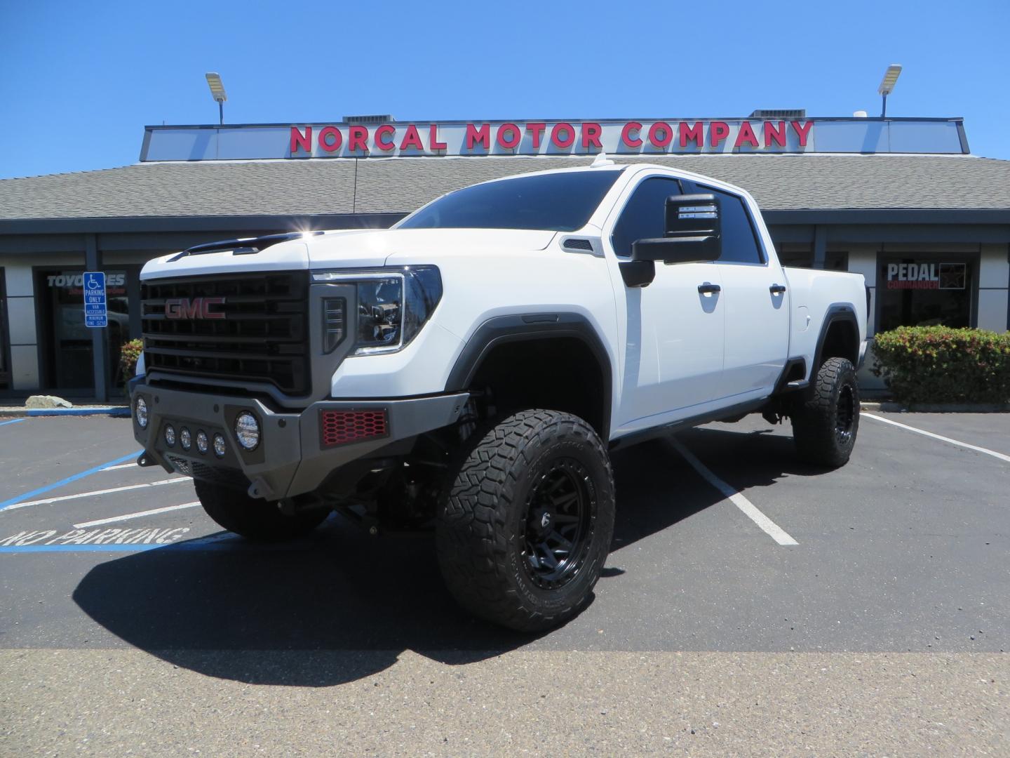 2021 White /black GMC Sierra 3500HD Denali (1GT49WEYXMF) with an 6.6L V8 TURBO DIESEL engine, automatic transmission, located at 2630 Grass Valley Highway, Auburn, CA, 95603, (530) 508-5100, 38.937893, -121.095482 - Must see Duramax with a ton of extras.... Cognito Suspension, Fox 2.0 remote reservoir shocks, 37" Nitto Recon Grappler tires, 20" Fuel Covert wheels, Sintor front and rear bumpers, Rigid LED lighting, Bakflip MX4, Gen Y hitch, Bolt locks, Amp Power steps, Window Tint, Sintor side badges, Smoked mar - Photo#0