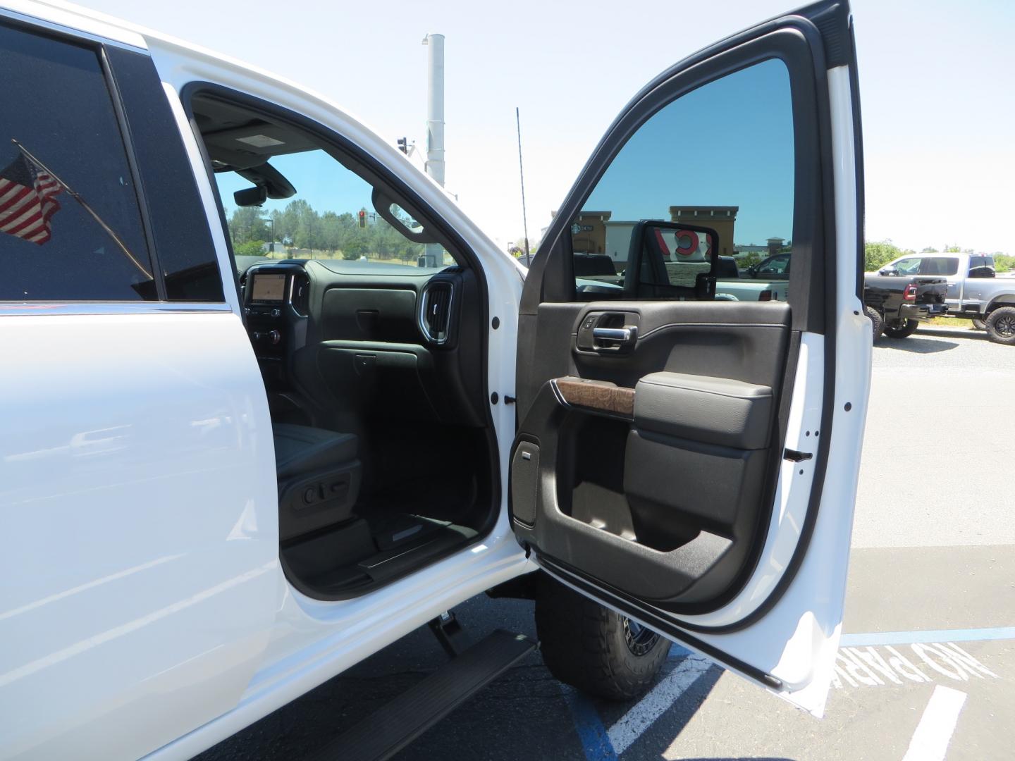 2021 White /black GMC Sierra 3500HD Denali (1GT49WEYXMF) with an 6.6L V8 TURBO DIESEL engine, automatic transmission, located at 2630 Grass Valley Highway, Auburn, CA, 95603, (530) 508-5100, 38.937893, -121.095482 - Must see Duramax with a ton of extras.... Cognito Suspension, Fox 2.0 remote reservoir shocks, 37" Nitto Recon Grappler tires, 20" Fuel Covert wheels, Sintor front and rear bumpers, Rigid LED lighting, Bakflip MX4, Gen Y hitch, Bolt locks, Amp Power steps, Window Tint, Sintor side badges, Smoked mar - Photo#50