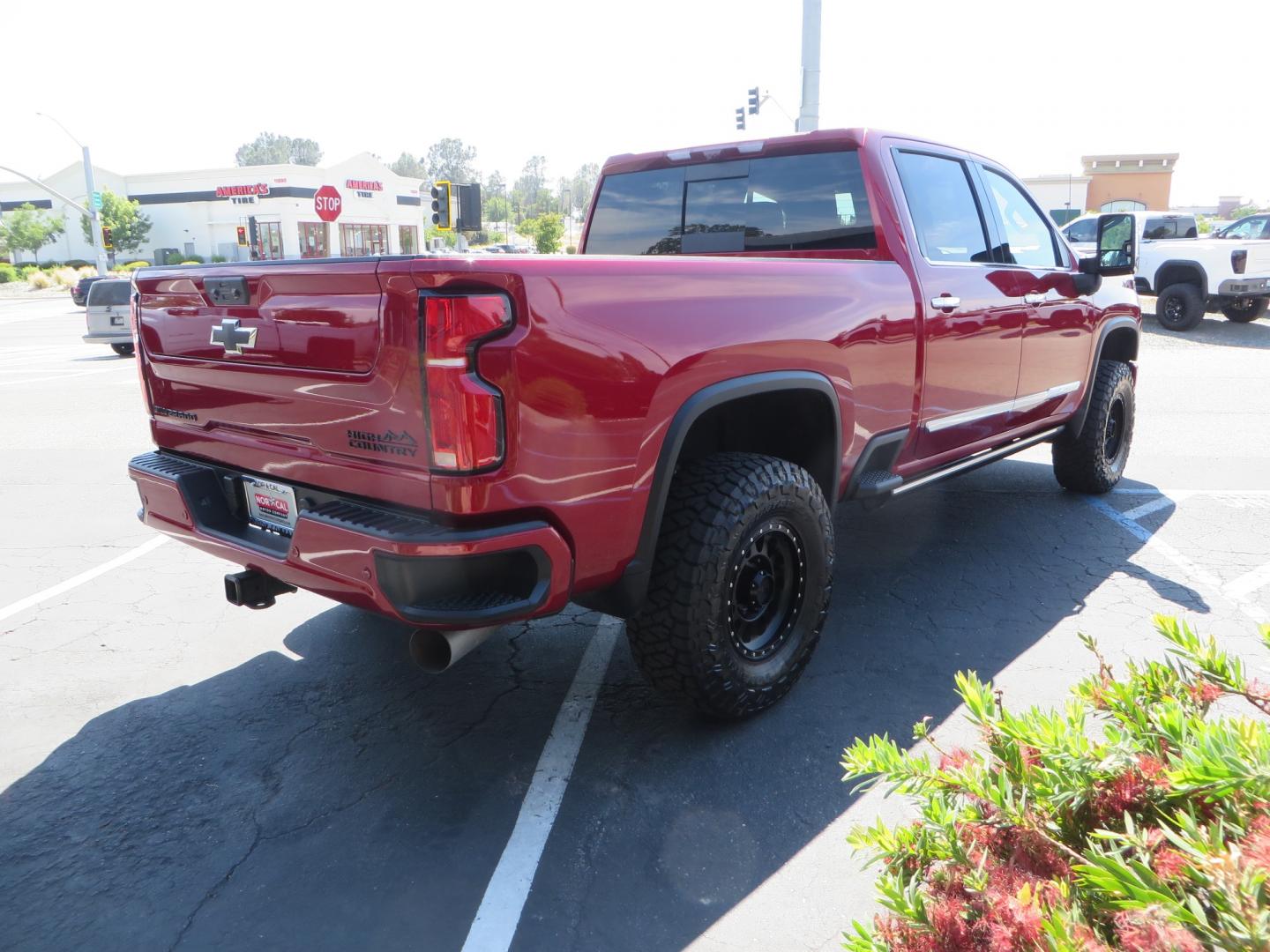 2024 MAROON /BLACK Chevrolet Silverado 2500HD High Country (1GC4YREY3RF) with an 6.6L V8 TURBO DIESEL engine, Automatic, 10-Spd transmission, located at 2630 Grass Valley Highway, Auburn, CA, 95603, (530) 508-5100, 38.937893, -121.095482 - Must see High Country Duramax with a Zone Offroad leveling kit, Fox 2.0 shocks, 17" Method MR315 wheels, and 35" Toyo RT trail tires. - Photo#4