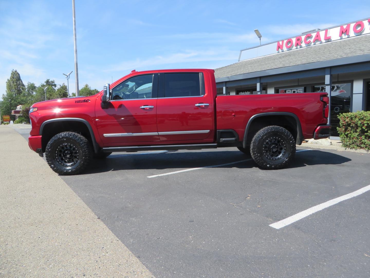 2024 MAROON /BLACK Chevrolet Silverado 2500HD High Country (1GC4YREY3RF) with an 6.6L V8 TURBO DIESEL engine, Automatic, 10-Spd transmission, located at 2630 Grass Valley Highway, Auburn, CA, 95603, (530) 508-5100, 38.937893, -121.095482 - Must see High Country Duramax with a Zone Offroad leveling kit, Fox 2.0 shocks, 17" Method MR315 wheels, and 35" Toyo RT trail tires. - Photo#7