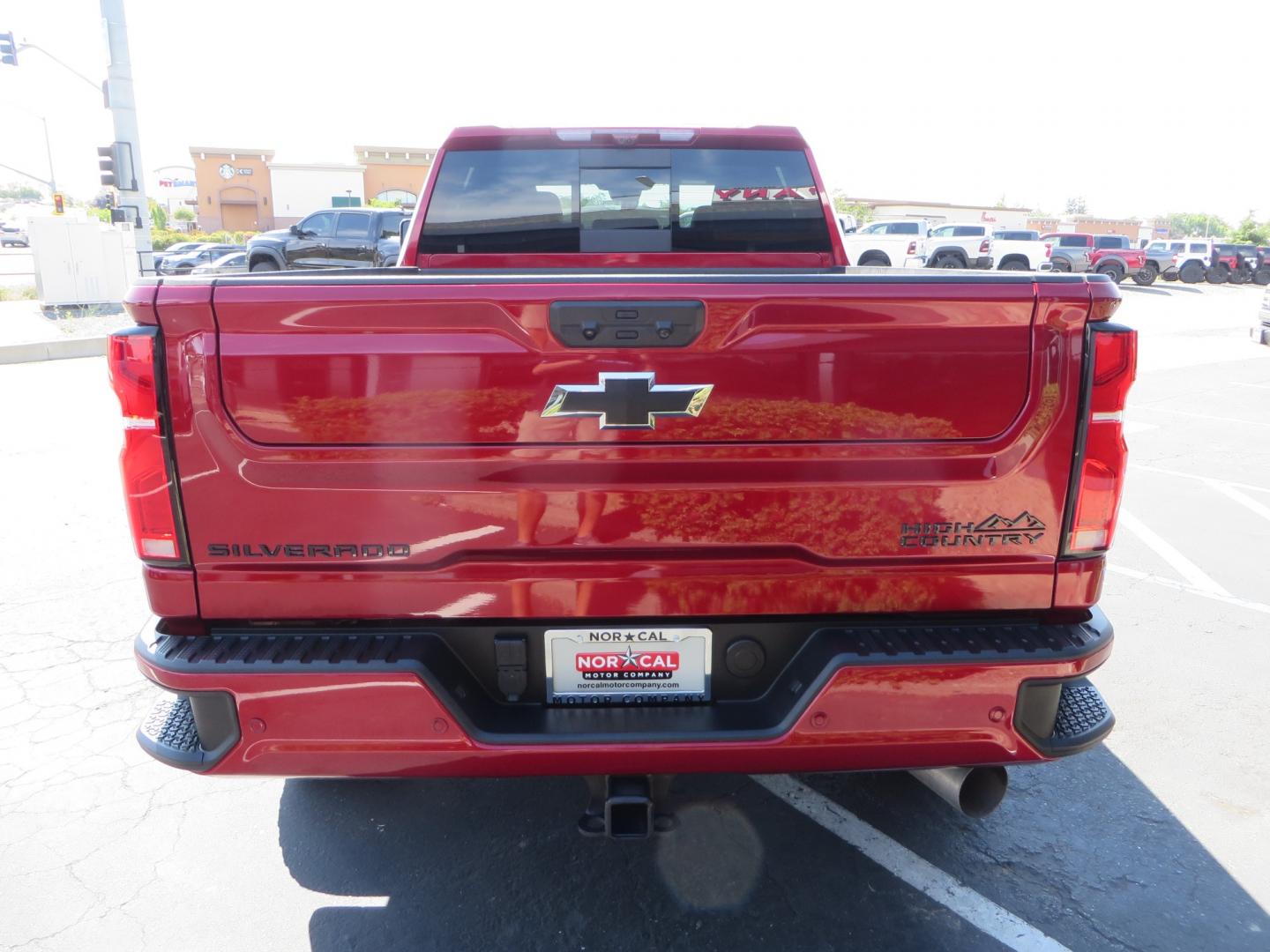 2024 MAROON /BLACK Chevrolet Silverado 2500HD High Country (1GC4YREY3RF) with an 6.6L V8 TURBO DIESEL engine, Automatic, 10-Spd transmission, located at 2630 Grass Valley Highway, Auburn, CA, 95603, (530) 508-5100, 38.937893, -121.095482 - Must see High Country Duramax with a Zone Offroad leveling kit, Fox 2.0 shocks, 17" Method MR315 wheels, and 35" Toyo RT trail tires. - Photo#5