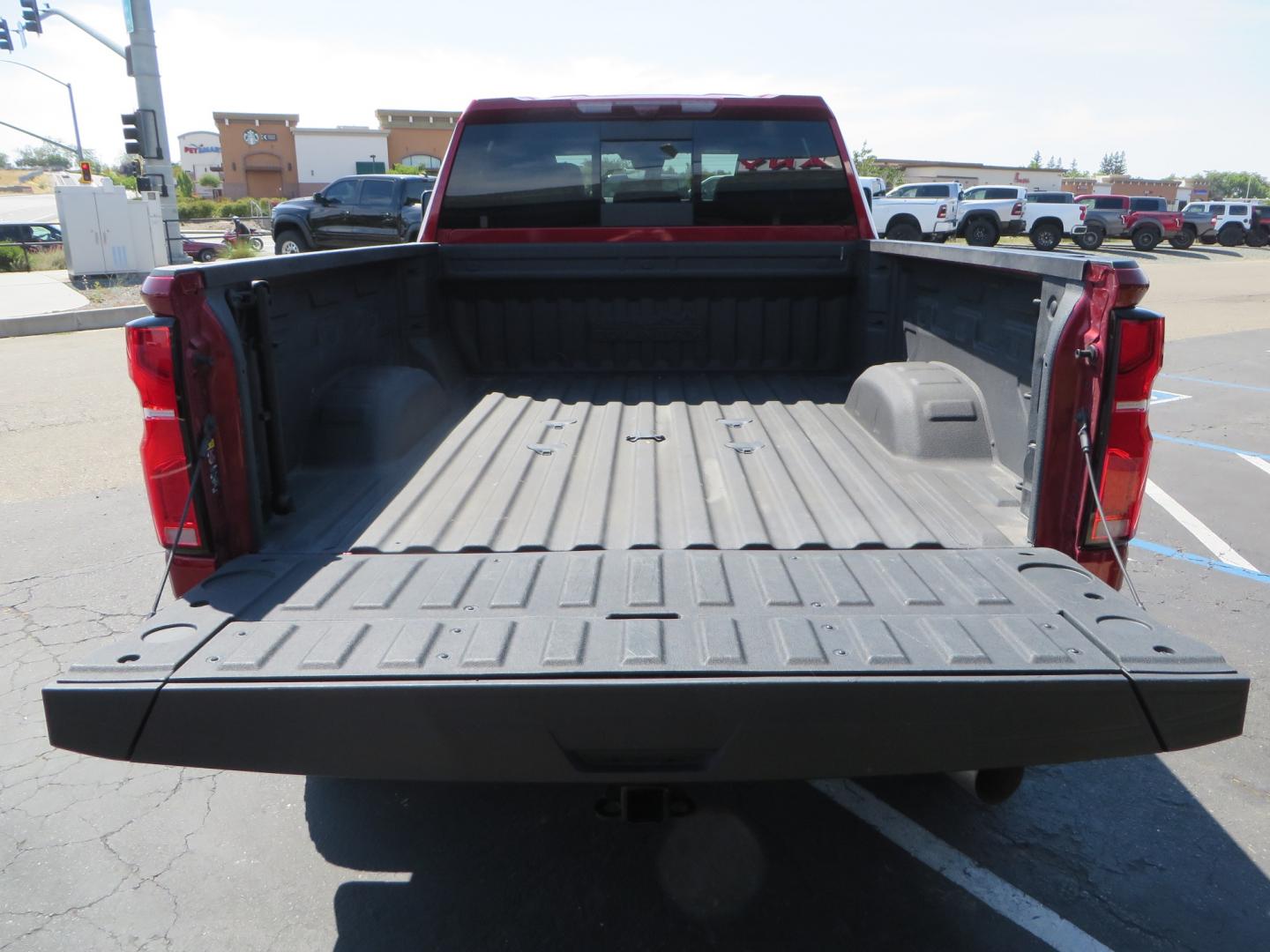 2024 MAROON /BLACK Chevrolet Silverado 2500HD High Country (1GC4YREY3RF) with an 6.6L V8 TURBO DIESEL engine, Automatic, 10-Spd transmission, located at 2630 Grass Valley Highway, Auburn, CA, 95603, (530) 508-5100, 38.937893, -121.095482 - Must see High Country Duramax with a Zone Offroad leveling kit, Fox 2.0 shocks, 17" Method MR315 wheels, and 35" Toyo RT trail tires. - Photo#12