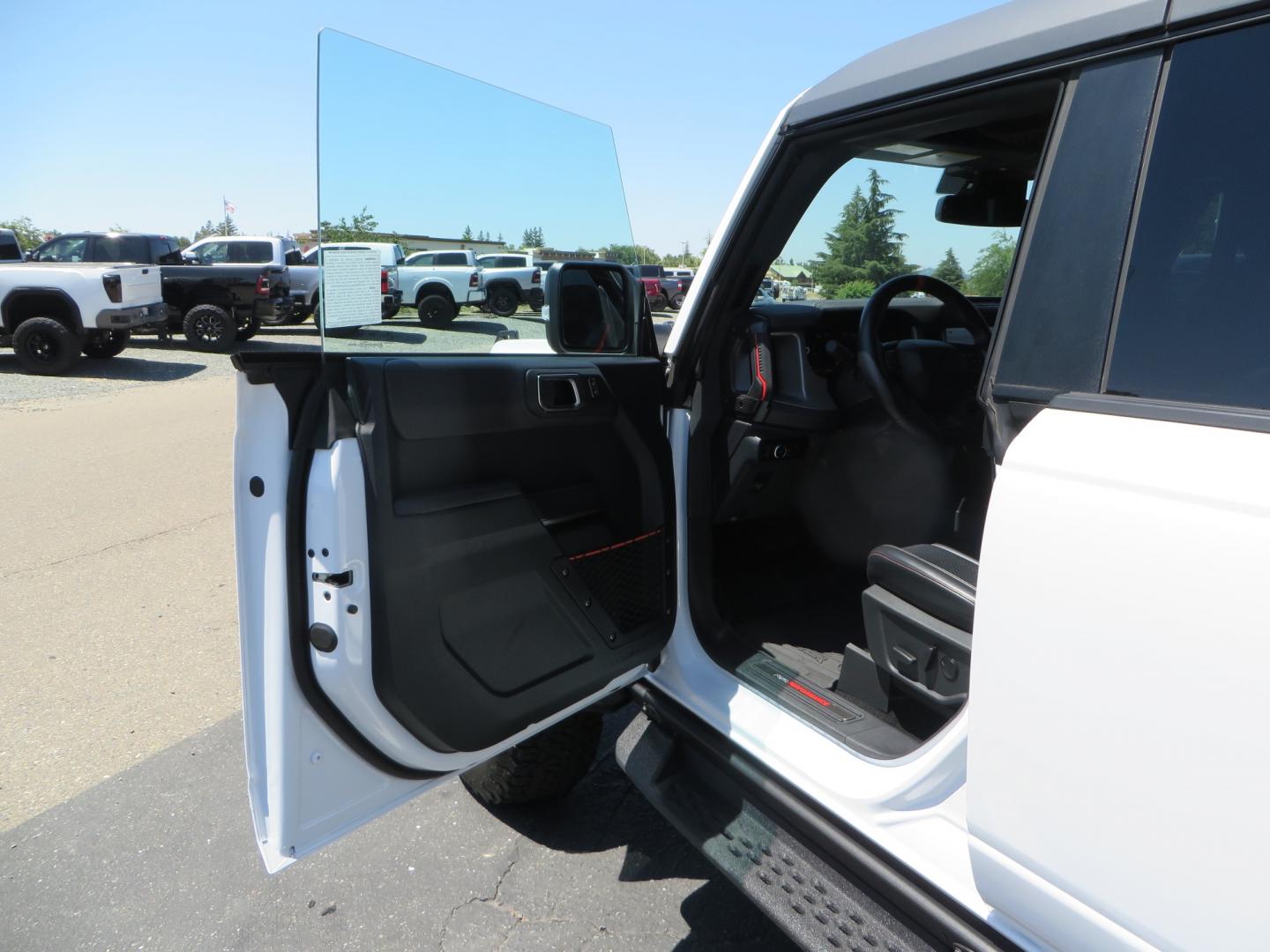 2023 White /BLACK Ford Bronco Raptor (1FMEE5JR6PL) with an 3.0L V6 DOHC 24V engine, automatic transmission, located at 2630 Grass Valley Highway, Auburn, CA, 95603, (530) 508-5100, 38.937893, -121.095482 - Ford Bronco Raptor - Photo#16