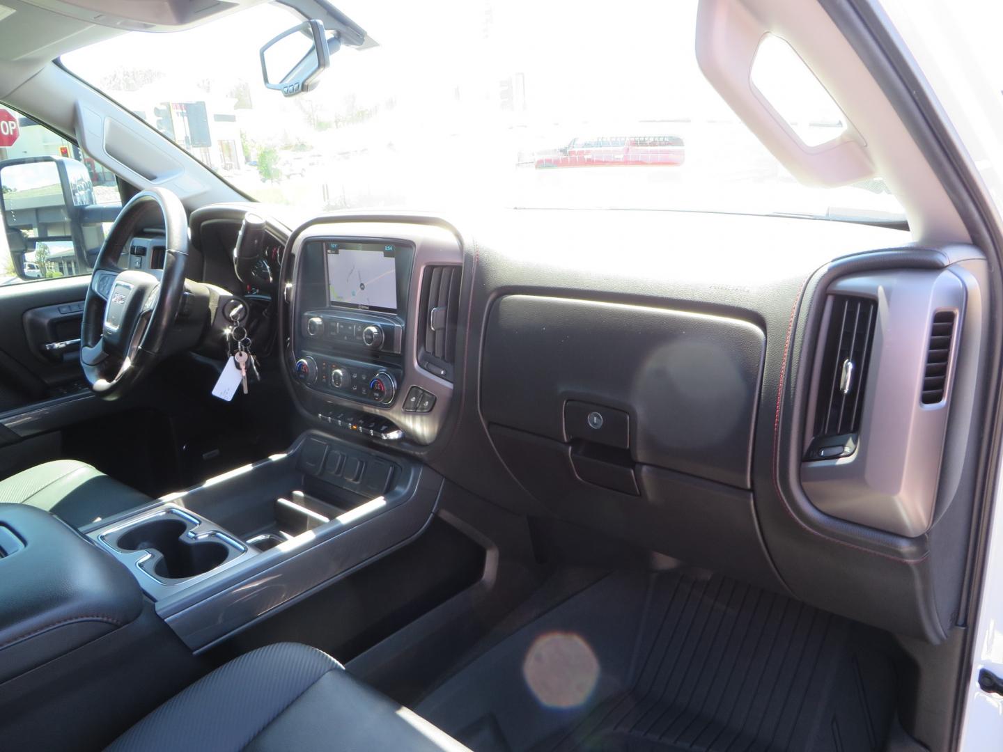 2017 White /BLACK GMC Sierra 3500HD SLT Crew Cab 4WD (1GT42XCY4HF) with an 6.6L V8 OHV 16 DIESEL engine, 6A transmission, located at 2630 Grass Valley Highway, Auburn, CA, 95603, (530) 508-5100, 38.937893, -121.095482 - Lifted GMC Duramax with Fox remote reservoir shocks, AMP Power steps, Rool N Lock tonneau cover, 20" Hostile Gauntlet wheels, BFG KO2 tires, all weather floor mats, window tint, and headrest DVD players. - Photo#47