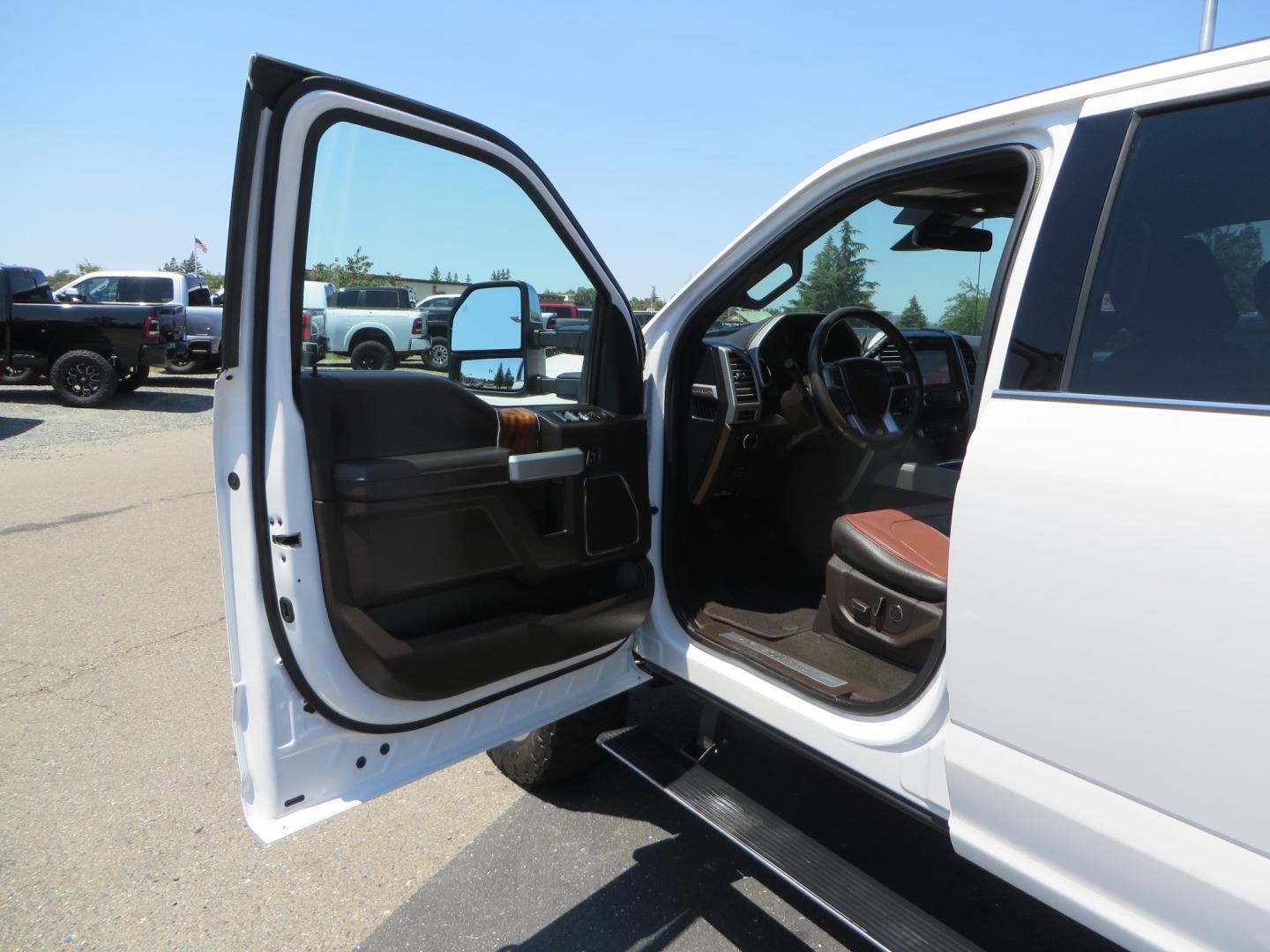 2018 White /BROWN Ford F-350 SD King Ranch Crew Cab 4WD (1FT8W3BT9JE) with an 6.7L V8 DIESEL engine, automatic transmission, located at 2630 Grass Valley Highway, Auburn, CA, 95603, (530) 508-5100, 38.937893, -121.095482 - Very clean King Ranch sitting on a level kit, 20" Gear wheels, and 35" Toyo AT3 tires. - Photo#16