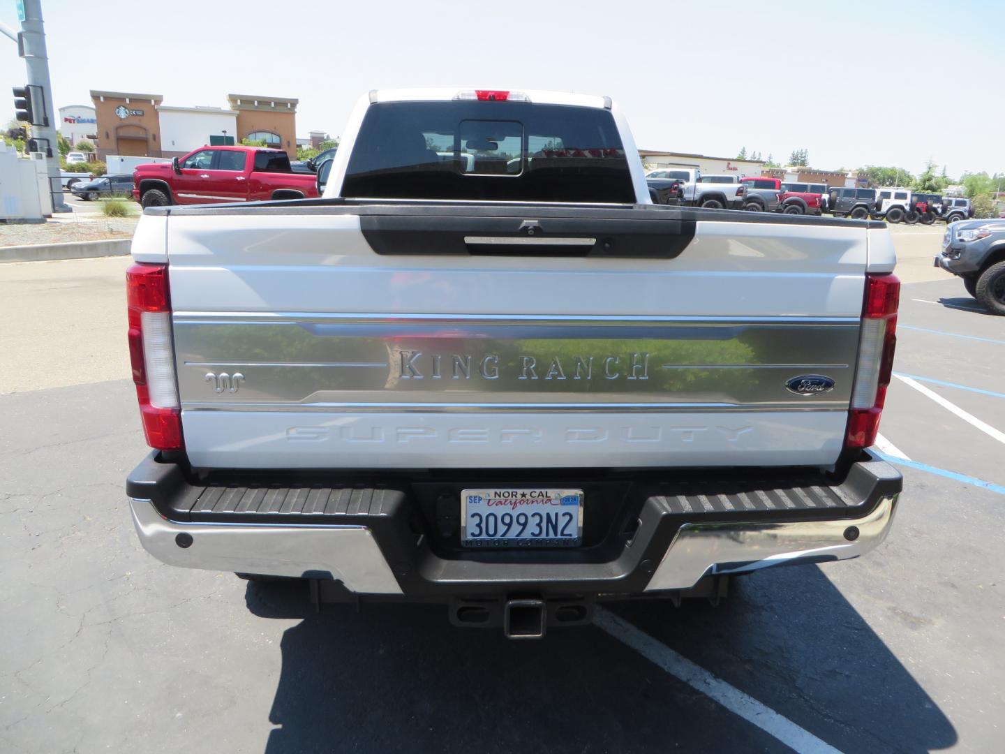 2018 White /BROWN Ford F-350 SD King Ranch Crew Cab 4WD (1FT8W3BT9JE) with an 6.7L V8 DIESEL engine, automatic transmission, located at 2630 Grass Valley Highway, Auburn, CA, 95603, (530) 508-5100, 38.937893, -121.095482 - Very clean King Ranch sitting on a level kit, 20" Gear wheels, and 35" Toyo AT3 tires. - Photo#5