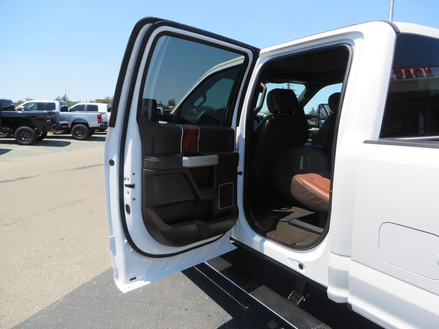 2018 White /BROWN Ford F-350 SD King Ranch Crew Cab 4WD (1FT8W3BT9JE) with an 6.7L V8 DIESEL engine, automatic transmission, located at 2630 Grass Valley Highway, Auburn, CA, 95603, (530) 508-5100, 38.937893, -121.095482 - Very clean King Ranch sitting on a level kit, 20" Gear wheels, and 35" Toyo AT3 tires. - Photo#37