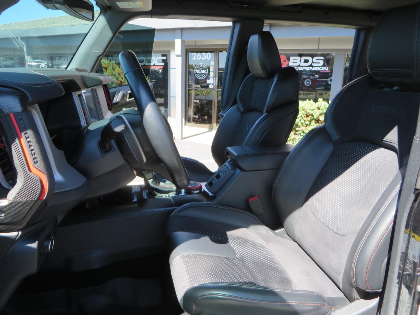 2022 BLACK Ford Bronco (1FMEE5JR9NL) , located at 2630 Grass Valley Highway, Auburn, CA, 95603, (530) 508-5100, 38.937893, -121.095482 - INCREDIBLE BUILD ON THIS 22 BRONCO RAPTOR..... - Leather/suede seating package - Lux Package (adaptive cruise, B&O 10 speaker sound system with sub, Heated steering wheel, wireless charging etc) - hard top - interior carbon fiber package Wheels/tires: - Method NV305 - 39” BFG KM3 tires - Photo#22