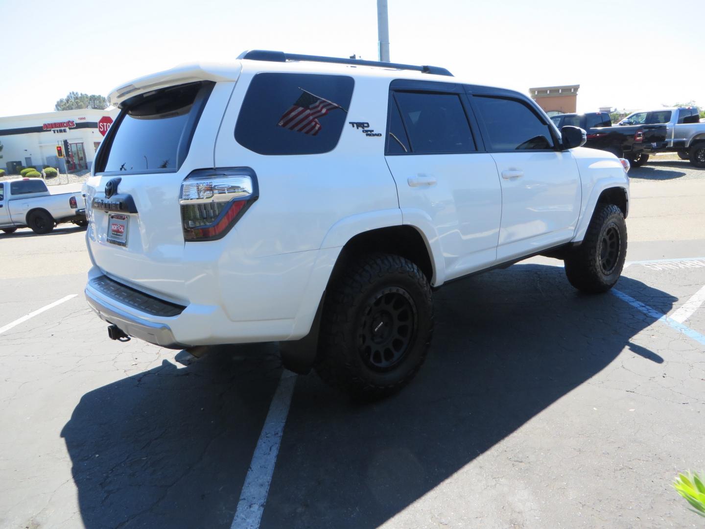 2021 White /Black Toyota 4Runner TRD Off-road Premium 4WD (JTERU5JR1M5) with an 4.0L V6 DOHC 24V engine, 5A transmission, located at 2630 Grass Valley Highway, Auburn, CA, 95603, (530) 508-5100, 38.937893, -121.095482 - TRD Off-Road with Bilstein 5100 series front struts, 17" Method race wheels, Toyo RT Trail tires, Window tint, and AVS window wind deflectors . - Photo#4