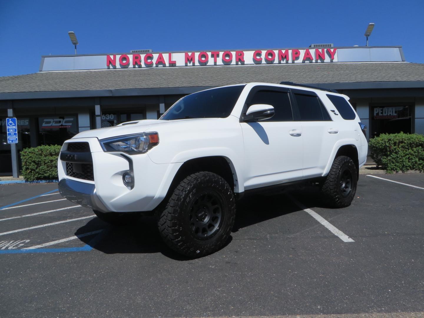 2021 White /Black Toyota 4Runner TRD Off-road Premium 4WD (JTERU5JR1M5) with an 4.0L V6 DOHC 24V engine, 5A transmission, located at 2630 Grass Valley Highway, Auburn, CA, 95603, (530) 508-5100, 38.937893, -121.095482 - TRD Off-Road with Bilstein 5100 series front struts, 17" Method race wheels, Toyo RT Trail tires, Window tint, and AVS window wind deflectors . - Photo#0