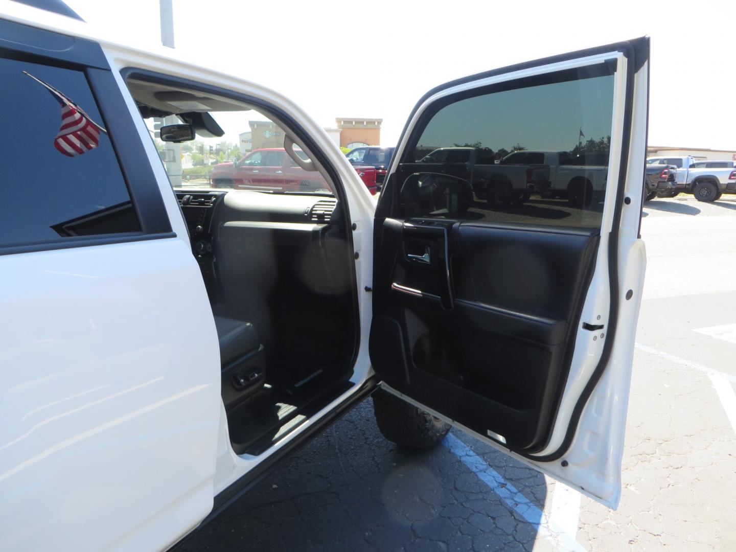 2021 White /Black Toyota 4Runner TRD Off-road Premium 4WD (JTERU5JR1M5) with an 4.0L V6 DOHC 24V engine, 5A transmission, located at 2630 Grass Valley Highway, Auburn, CA, 95603, (530) 508-5100, 38.937893, -121.095482 - TRD Off-Road with Bilstein 5100 series front struts, 17" Method race wheels, Toyo RT Trail tires, Window tint, and AVS window wind deflectors . - Photo#40