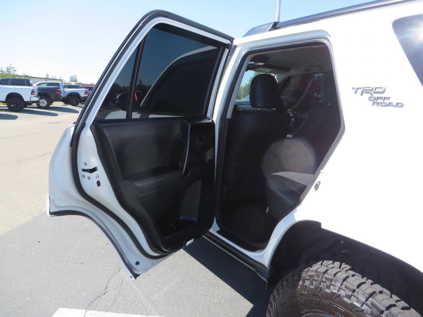 2021 White /Black Toyota 4Runner TRD Off-road Premium 4WD (JTERU5JR1M5) with an 4.0L V6 DOHC 24V engine, 5A transmission, located at 2630 Grass Valley Highway, Auburn, CA, 95603, (530) 508-5100, 38.937893, -121.095482 - TRD Off-Road with Bilstein 5100 series front struts, 17" Method race wheels, Toyo RT Trail tires, Window tint, and AVS window wind deflectors . - Photo#32