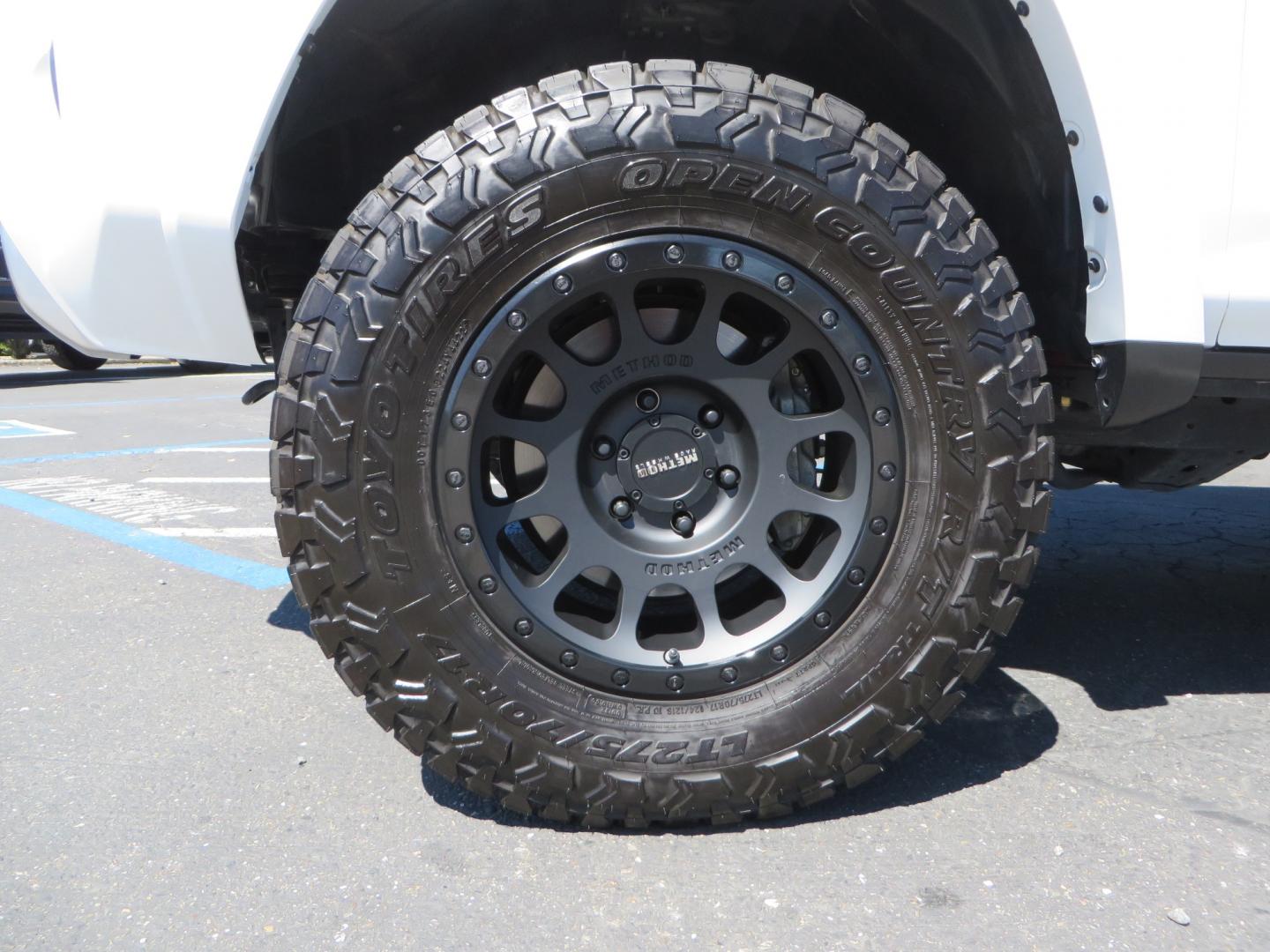 2021 White /Black Toyota 4Runner TRD Off-road Premium 4WD (JTERU5JR1M5) with an 4.0L V6 DOHC 24V engine, 5A transmission, located at 2630 Grass Valley Highway, Auburn, CA, 95603, (530) 508-5100, 38.937893, -121.095482 - TRD Off-Road with Bilstein 5100 series front struts, 17" Method race wheels, Toyo RT Trail tires, Window tint, and AVS window wind deflectors . - Photo#8