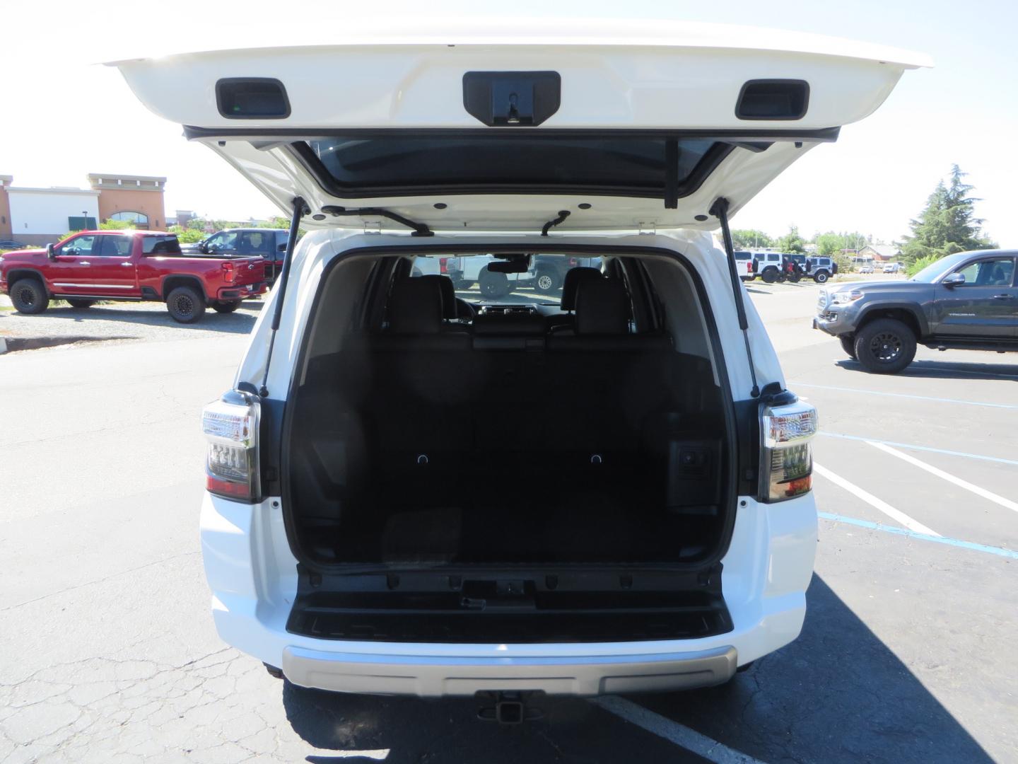 2021 White /Black Toyota 4Runner TRD Off-road Premium 4WD (JTERU5JR1M5) with an 4.0L V6 DOHC 24V engine, 5A transmission, located at 2630 Grass Valley Highway, Auburn, CA, 95603, (530) 508-5100, 38.937893, -121.095482 - TRD Off-Road with Bilstein 5100 series front struts, 17" Method race wheels, Toyo RT Trail tires, Window tint, and AVS window wind deflectors . - Photo#54