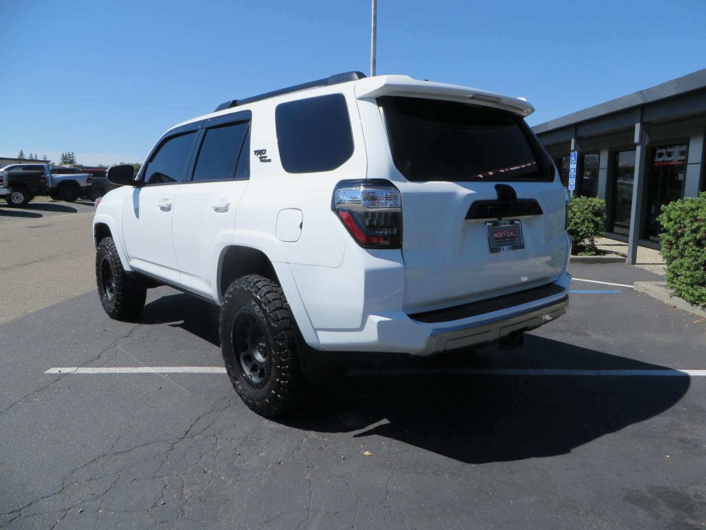 2021 White /Black Toyota 4Runner TRD Off-road Premium 4WD (JTERU5JR1M5) with an 4.0L V6 DOHC 24V engine, 5A transmission, located at 2630 Grass Valley Highway, Auburn, CA, 95603, (530) 508-5100, 38.937893, -121.095482 - TRD Off-Road with Bilstein 5100 series front struts, 17" Method race wheels, Toyo RT Trail tires, Window tint, and AVS window wind deflectors . - Photo#6