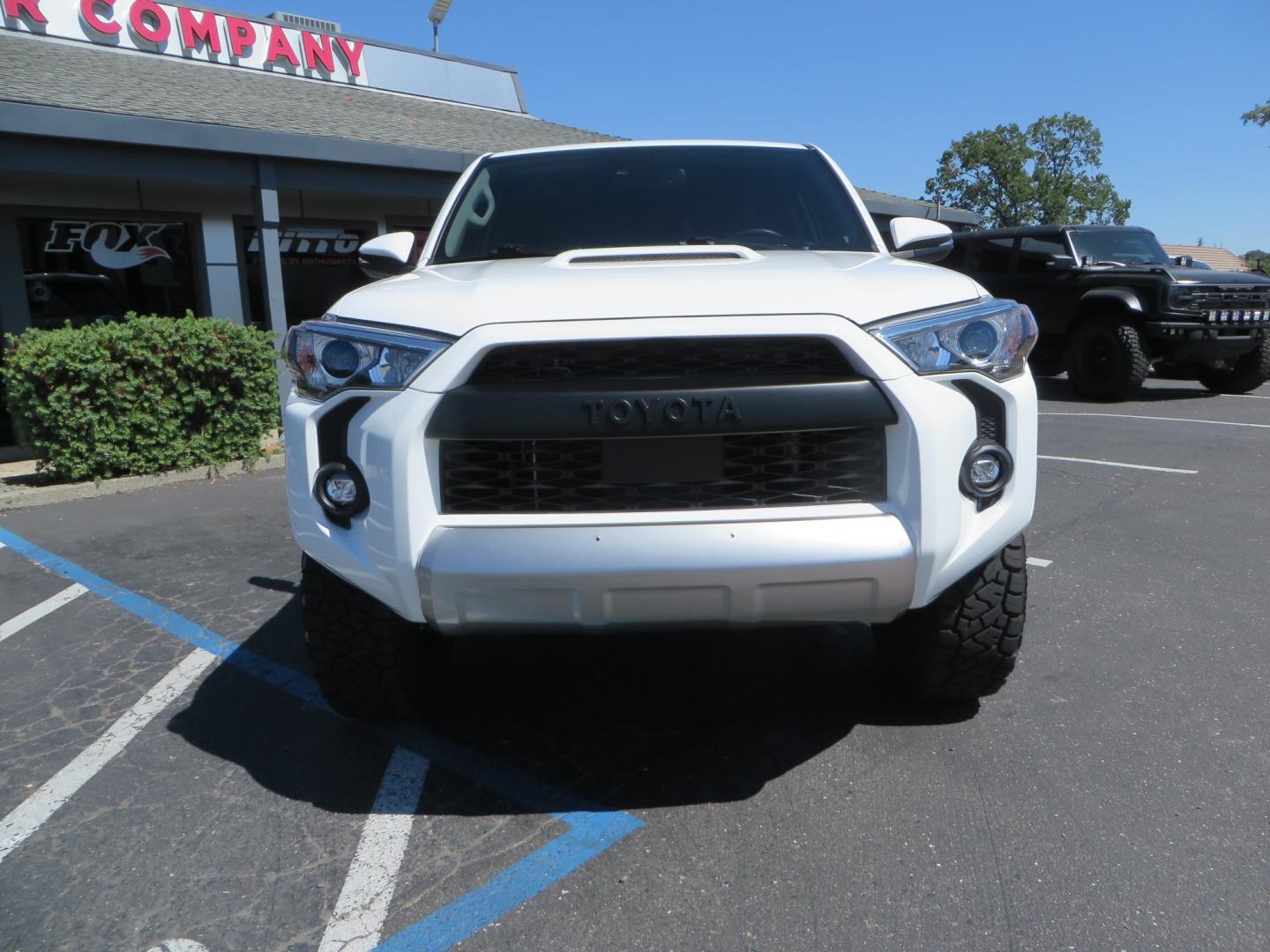 2021 White /Black Toyota 4Runner TRD Off-road Premium 4WD (JTERU5JR1M5) with an 4.0L V6 DOHC 24V engine, 5A transmission, located at 2630 Grass Valley Highway, Auburn, CA, 95603, (530) 508-5100, 38.937893, -121.095482 - TRD Off-Road with Bilstein 5100 series front struts, 17" Method race wheels, Toyo RT Trail tires, Window tint, and AVS window wind deflectors . - Photo#1