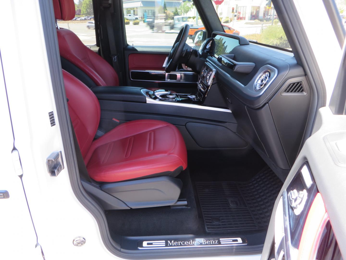 2021 White /Red Mercedes-Benz G-Class G 550 (W1NYC6BJ1MX) with an 4.0L V8 engine, automatic transmission, located at 2630 Grass Valley Highway, Auburn, CA, 95603, (530) 508-5100, 38.937893, -121.095482 - Features Vossen Wheels and Toyo AT3 tires. Also has the stock wheels and tires as well. - Photo#39