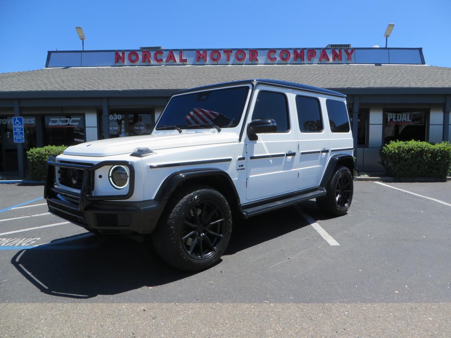 2021 White /Red Mercedes-Benz G-Class G 550 (W1NYC6BJ1MX) with an 4.0L V8 engine, automatic transmission, located at 2630 Grass Valley Highway, Auburn, CA, 95603, (530) 508-5100, 38.937893, -121.095482 - Features Vossen Wheels and Toyo AT3 tires. Also has the stock wheels and tires as well. - Photo#0