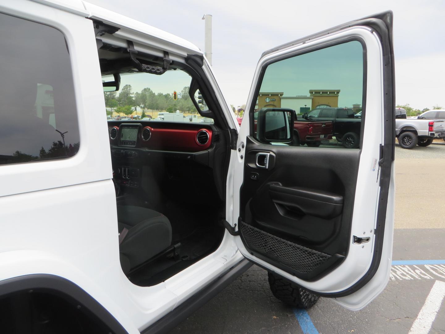 2021 White /Black Jeep Wrangler Rubicon (1C4HJXCG0MW) with an 3.6L V6 engine, Manual 6 speed transmission, located at 2630 Grass Valley Highway, Auburn, CA, 95603, (530) 508-5100, 38.937893, -121.095482 - 2 Door lifted Rubicon featuring a 3" Zone Offroad lift kit, Fox Adventure series shocks, 17" Method wheels, 37" Toyo RT Trail tires, Teraflex Spare tire carrier, and window tint. - Photo#31