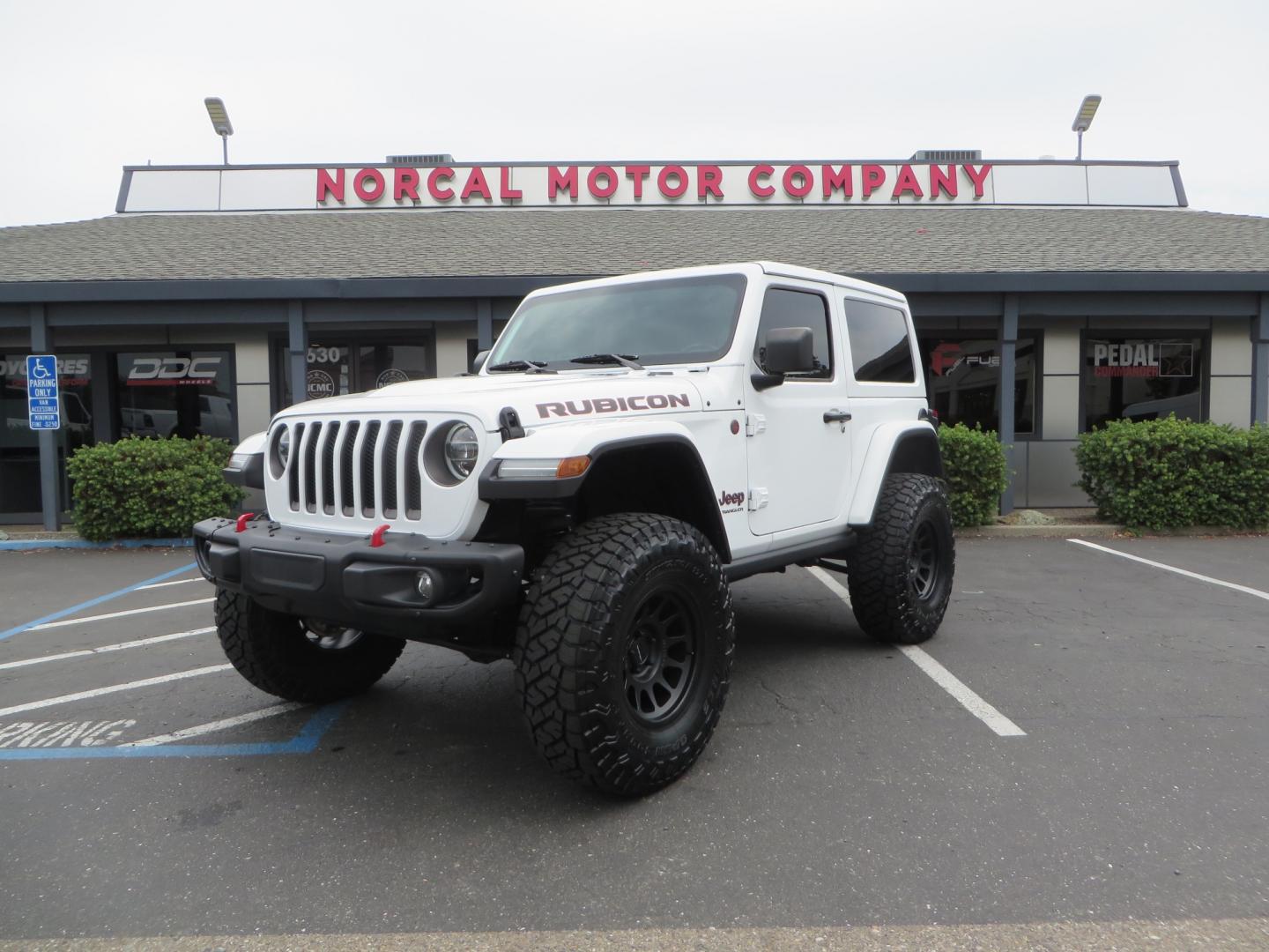 2021 White /Black Jeep Wrangler Rubicon (1C4HJXCG0MW) with an 3.6L V6 engine, Manual 6 speed transmission, located at 2630 Grass Valley Highway, Auburn, CA, 95603, (530) 508-5100, 38.937893, -121.095482 - 2 Door lifted Rubicon featuring a 3" Zone Offroad lift kit, Fox Adventure series shocks, 17" Method wheels, 37" Toyo RT Trail tires, Teraflex Spare tire carrier, and window tint. - Photo#0