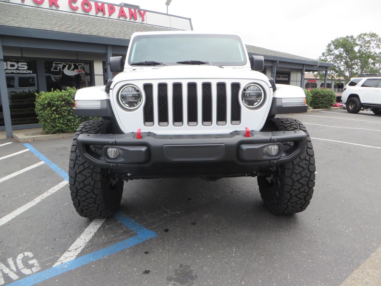 2021 White /Black Jeep Wrangler Rubicon (1C4HJXCG0MW) with an 3.6L V6 engine, Manual 6 speed transmission, located at 2630 Grass Valley Highway, Auburn, CA, 95603, (530) 508-5100, 38.937893, -121.095482 - 2 Door lifted Rubicon featuring a 3" Zone Offroad lift kit, Fox Adventure series shocks, 17" Method wheels, 37" Toyo RT Trail tires, Teraflex Spare tire carrier, and window tint. - Photo#1