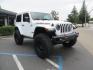 2021 White /Black Jeep Wrangler Rubicon (1C4HJXCG0MW) with an 3.6L V6 engine, Manual 6 speed transmission, located at 2630 Grass Valley Highway, Auburn, CA, 95603, (530) 508-5100, 38.937893, -121.095482 - 2 Door lifted Rubicon featuring a 3" Zone Offroad lift kit, Fox Adventure series shocks, 17" Method wheels, 37" Toyo RT Trail tires, Teraflex Spare tire carrier, and window tint. - Photo#2