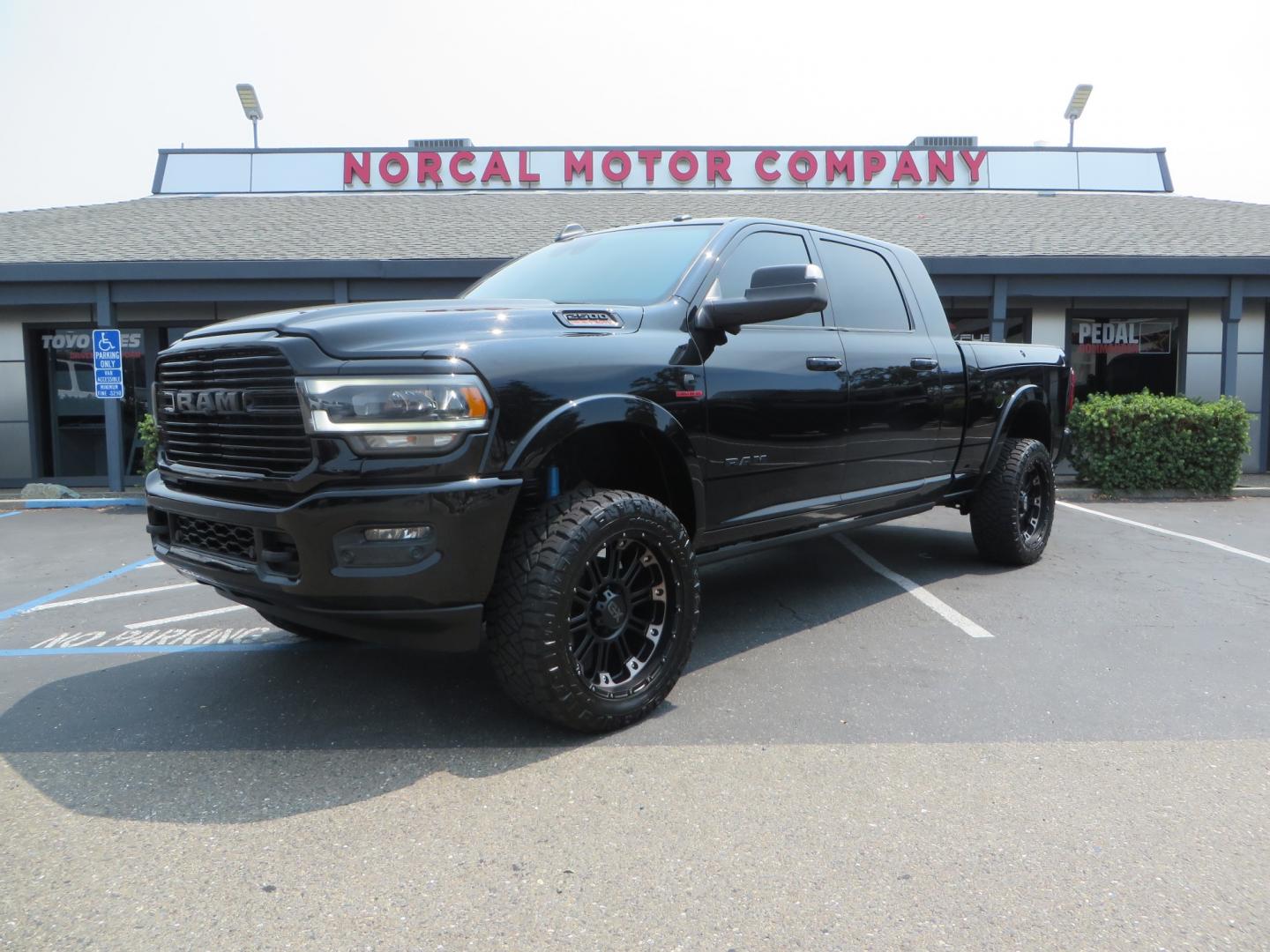 2019 BLACK /BLACK RAM 2500 Laramie Mega Cab 4WD (3C6UR5NL5KG) with an 6.7L L6 OHV 24V TURBO DIESEL engine, 6A transmission, located at 2630 Grass Valley Highway, Auburn, CA, 95603, (530) 508-5100, 38.937893, -121.095482 - Features -- 22" XD wheels, Nitto Ridge Grappler tires, Level kit, and window tint. - Photo#0