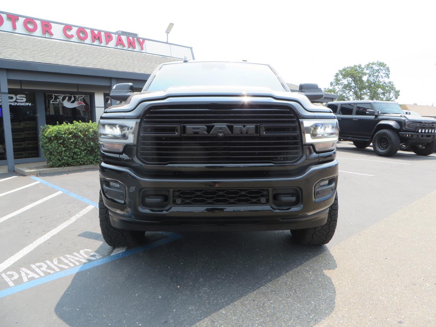 2019 BLACK /BLACK RAM 2500 Laramie Mega Cab 4WD (3C6UR5NL5KG) with an 6.7L L6 OHV 24V TURBO DIESEL engine, 6A transmission, located at 2630 Grass Valley Highway, Auburn, CA, 95603, (530) 508-5100, 38.937893, -121.095482 - Features -- 22" XD wheels, Nitto Ridge Grappler tires, Level kit, and window tint. - Photo#1