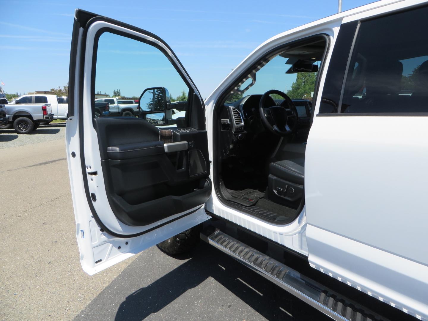 2017 White Ford F-250 SD Lariat Crew Cab Short Bed 4WD (1FT7W2BT4HE) with an 6.7L V8 OHV 16V DIESEL engine, 6A transmission, located at 2630 Grass Valley Highway, Auburn, CA, 95603, (530) 508-5100, 38.937893, -121.095482 - Leveled F250 sitting on brand new 17" Method Race wheels and Nitto Recon Grappler tires. - Photo#14