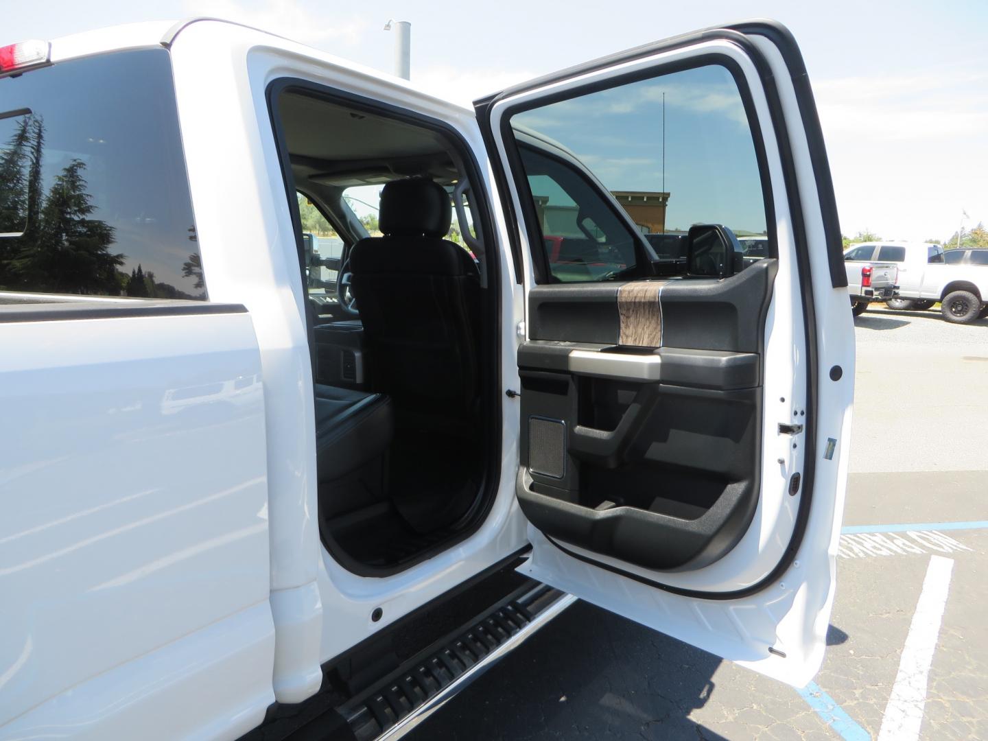 2017 White Ford F-250 SD Lariat Crew Cab Short Bed 4WD (1FT7W2BT4HE) with an 6.7L V8 OHV 16V DIESEL engine, 6A transmission, located at 2630 Grass Valley Highway, Auburn, CA, 95603, (530) 508-5100, 38.937893, -121.095482 - Leveled F250 sitting on brand new 17" Method Race wheels and Nitto Recon Grappler tires. - Photo#48