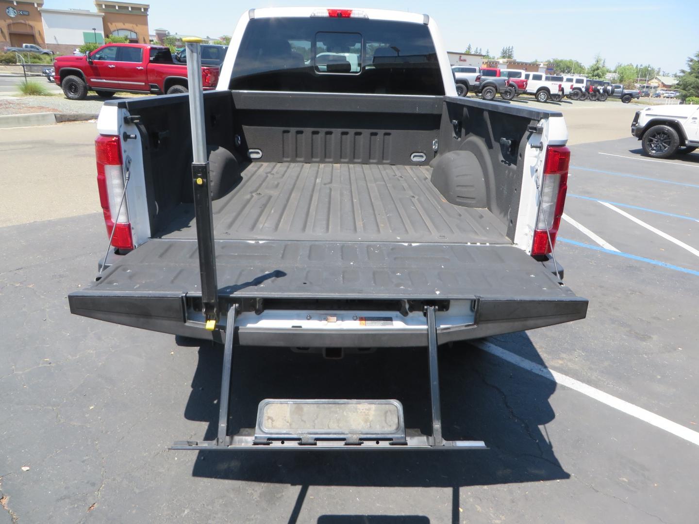 2017 White Ford F-250 SD Lariat Crew Cab Short Bed 4WD (1FT7W2BT4HE) with an 6.7L V8 OHV 16V DIESEL engine, 6A transmission, located at 2630 Grass Valley Highway, Auburn, CA, 95603, (530) 508-5100, 38.937893, -121.095482 - Leveled F250 sitting on brand new 17" Method Race wheels and Nitto Recon Grappler tires. - Photo#11