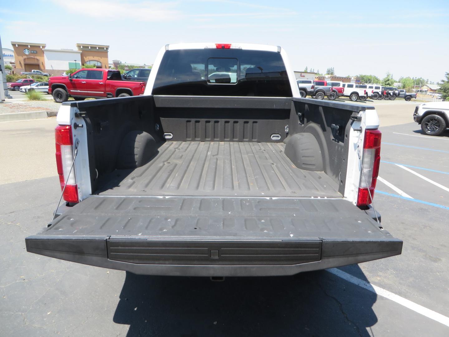 2017 White Ford F-250 SD Lariat Crew Cab Short Bed 4WD (1FT7W2BT4HE) with an 6.7L V8 OHV 16V DIESEL engine, 6A transmission, located at 2630 Grass Valley Highway, Auburn, CA, 95603, (530) 508-5100, 38.937893, -121.095482 - Leveled F250 sitting on brand new 17" Method Race wheels and Nitto Recon Grappler tires. - Photo#10