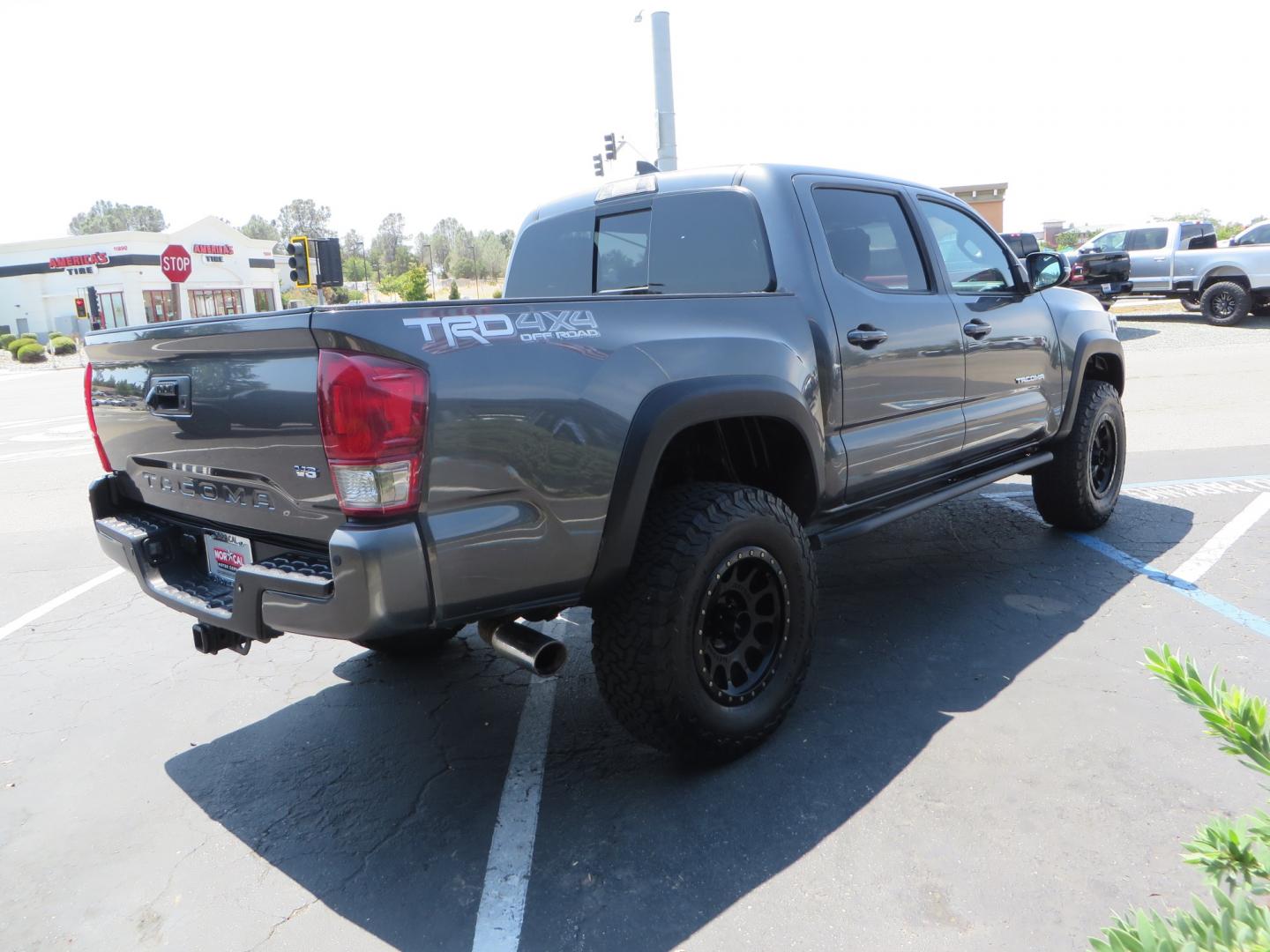 2017 CHARCOAL /GREY Toyota Tacoma TRD Off-Road Double Cab Short Bed V6 6AT 4WD (3TMCZ5AN6HM) with an 3.6L V6 DOHC 24V engine, 6A transmission, located at 2630 Grass Valley Highway, Auburn, CA, 95603, (530) 508-5100, 38.937893, -121.095482 - Features- Method Race wheels, BFG KO2 tires, Rocksliders, Bedmat, and Magnaflow exhaust. - Photo#4