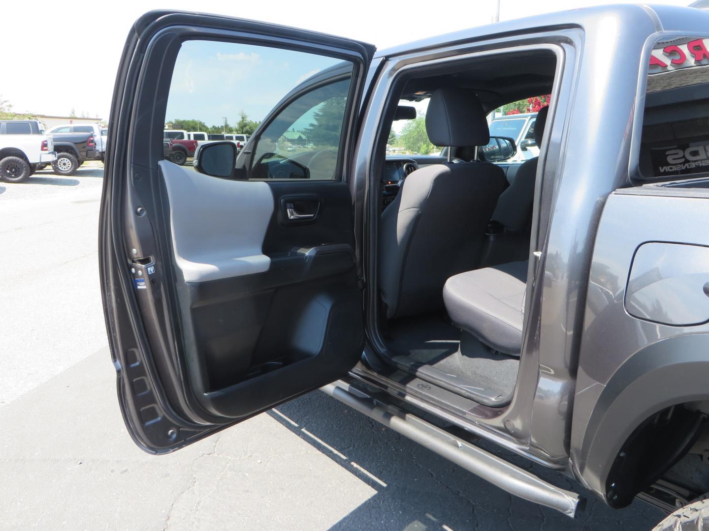 2017 CHARCOAL /GREY Toyota Tacoma TRD Off-Road Double Cab Short Bed V6 6AT 4WD (3TMCZ5AN6HM) with an 3.6L V6 DOHC 24V engine, 6A transmission, located at 2630 Grass Valley Highway, Auburn, CA, 95603, (530) 508-5100, 38.937893, -121.095482 - Features- Method Race wheels, BFG KO2 tires, Rocksliders, Bedmat, and Magnaflow exhaust. - Photo#30