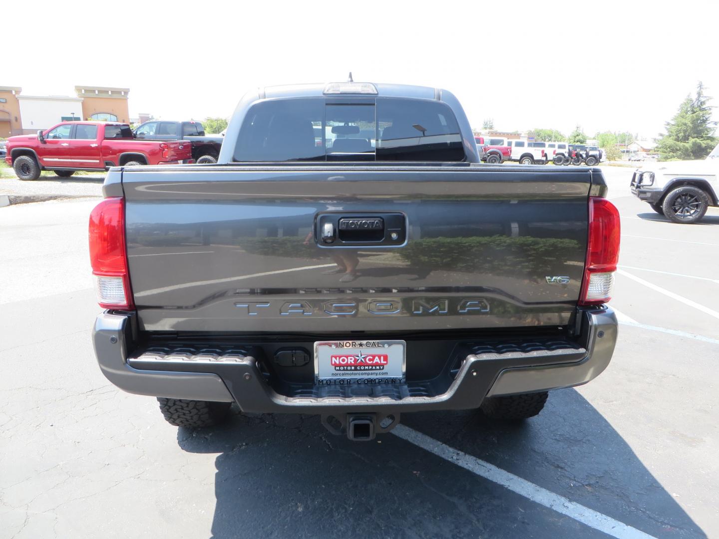 2017 CHARCOAL /GREY Toyota Tacoma TRD Off-Road Double Cab Short Bed V6 6AT 4WD (3TMCZ5AN6HM) with an 3.6L V6 DOHC 24V engine, 6A transmission, located at 2630 Grass Valley Highway, Auburn, CA, 95603, (530) 508-5100, 38.937893, -121.095482 - Features- Method Race wheels, BFG KO2 tires, Rocksliders, Bedmat, and Magnaflow exhaust. - Photo#5