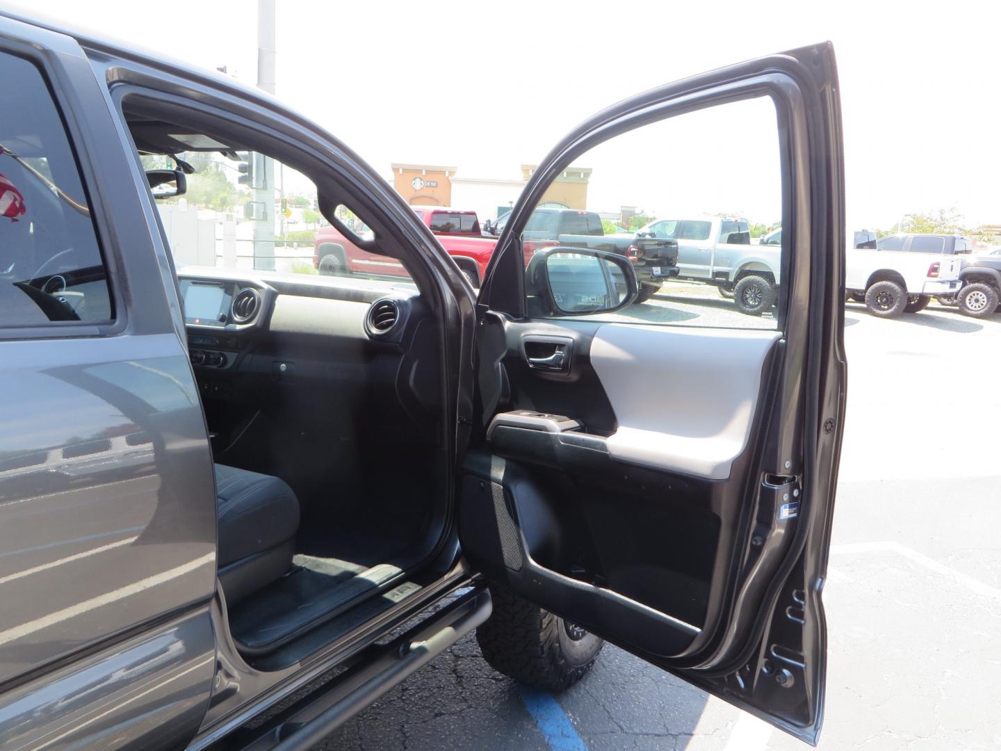 2017 CHARCOAL /GREY Toyota Tacoma TRD Off-Road Double Cab Short Bed V6 6AT 4WD (3TMCZ5AN6HM) with an 3.6L V6 DOHC 24V engine, 6A transmission, located at 2630 Grass Valley Highway, Auburn, CA, 95603, (530) 508-5100, 38.937893, -121.095482 - Features- Method Race wheels, BFG KO2 tires, Rocksliders, Bedmat, and Magnaflow exhaust. - Photo#36