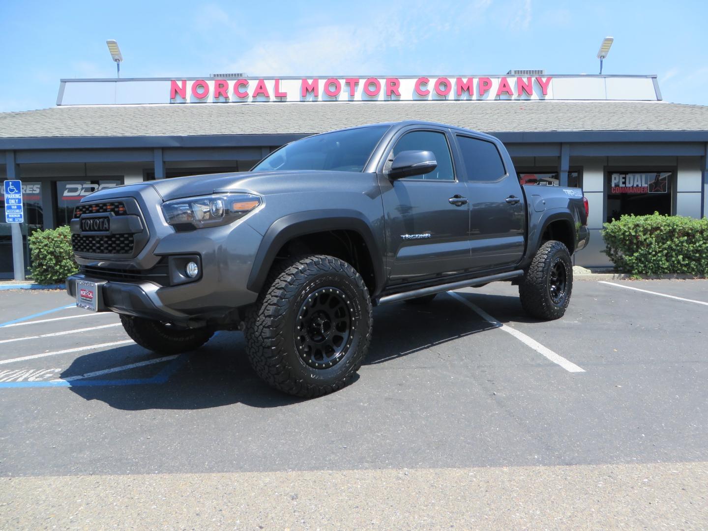 2017 CHARCOAL /GREY Toyota Tacoma TRD Off-Road Double Cab Short Bed V6 6AT 4WD (3TMCZ5AN6HM) with an 3.6L V6 DOHC 24V engine, 6A transmission, located at 2630 Grass Valley Highway, Auburn, CA, 95603, (530) 508-5100, 38.937893, -121.095482 - Features- Method Race wheels, BFG KO2 tires, Rocksliders, Bedmat, and Magnaflow exhaust. - Photo#0