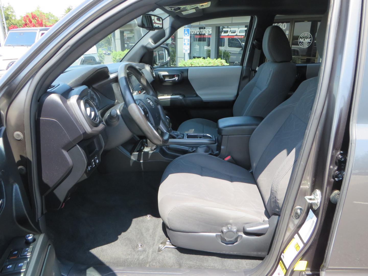 2017 CHARCOAL /GREY Toyota Tacoma TRD Off-Road Double Cab Short Bed V6 6AT 4WD (3TMCZ5AN6HM) with an 3.6L V6 DOHC 24V engine, 6A transmission, located at 2630 Grass Valley Highway, Auburn, CA, 95603, (530) 508-5100, 38.937893, -121.095482 - Features- Method Race wheels, BFG KO2 tires, Rocksliders, Bedmat, and Magnaflow exhaust. - Photo#16