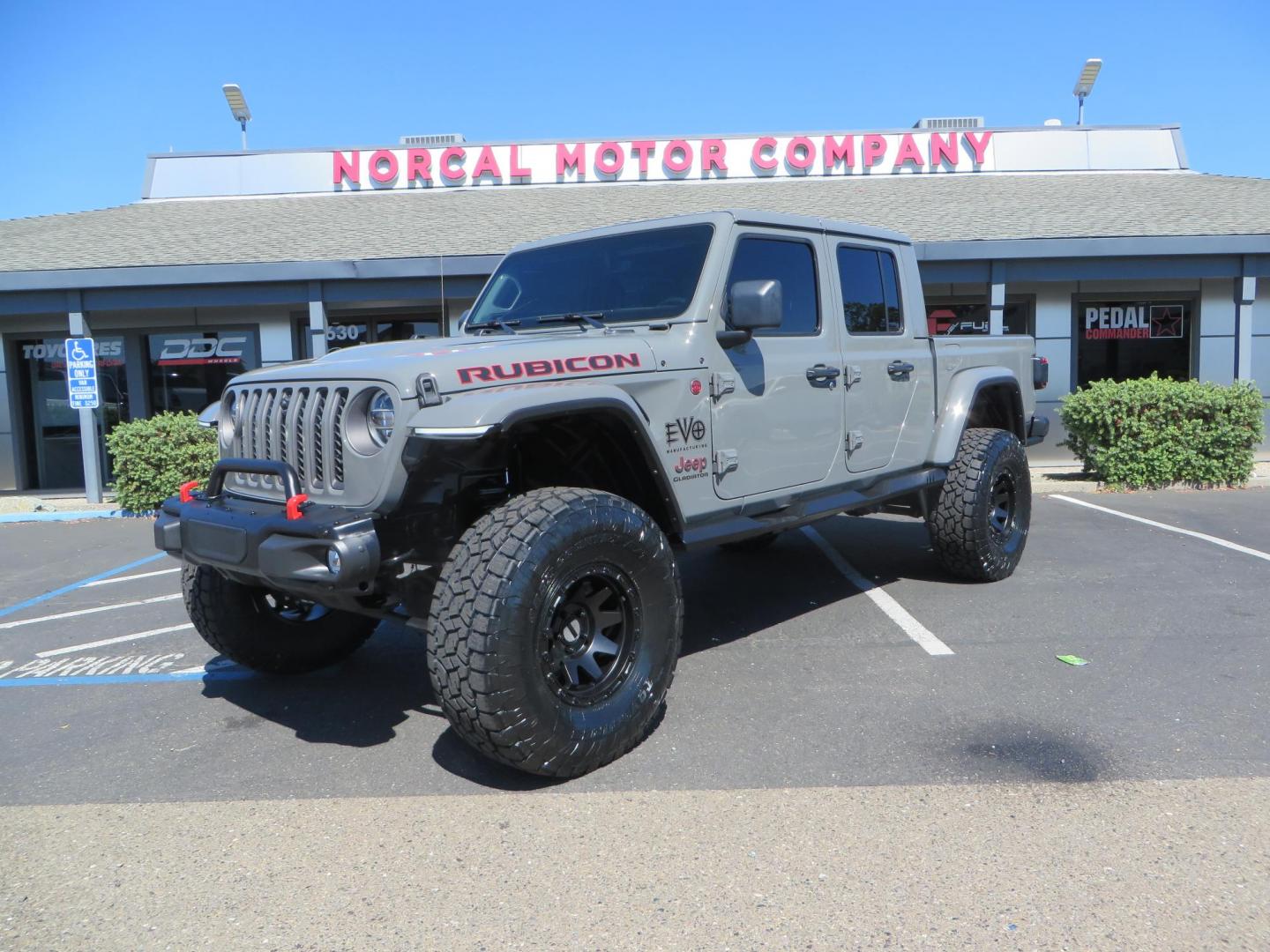 2021 Sting Grey /BLACK Jeep Gladiator Rubicon (1C6JJTBM1ML) with an 3.6L V6 DOHC 24V engine, 6M transmission, located at 2630 Grass Valley Highway, Auburn, CA, 95603, (530) 508-5100, 38.937893, -121.095482 - Features- EVO MFG 4.5" suspension system, 17" Method Race wheels, 37" Toyo AT3 tires, Fabfours running boards, Weathertech bedmat, Bolt on front pre runner bar, and window tint. - Photo#0