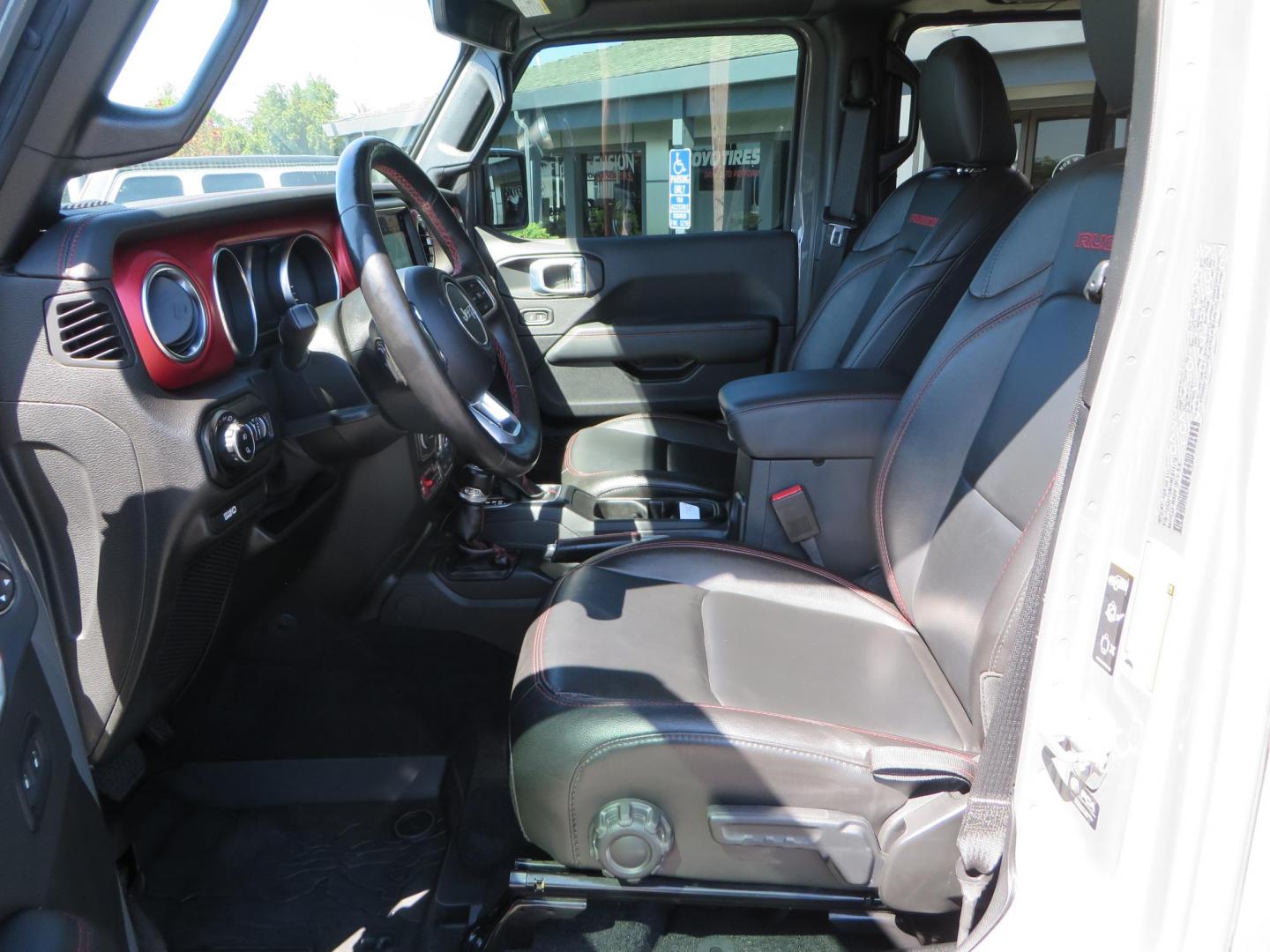 2021 Sting Grey /BLACK Jeep Gladiator Rubicon (1C6JJTBM1ML) with an 3.6L V6 DOHC 24V engine, 6M transmission, located at 2630 Grass Valley Highway, Auburn, CA, 95603, (530) 508-5100, 38.937893, -121.095482 - Features- EVO MFG 4.5" suspension system, 17" Method Race wheels, 37" Toyo AT3 tires, Fabfours running boards, Weathertech bedmat, Bolt on front pre runner bar, and window tint. - Photo#16