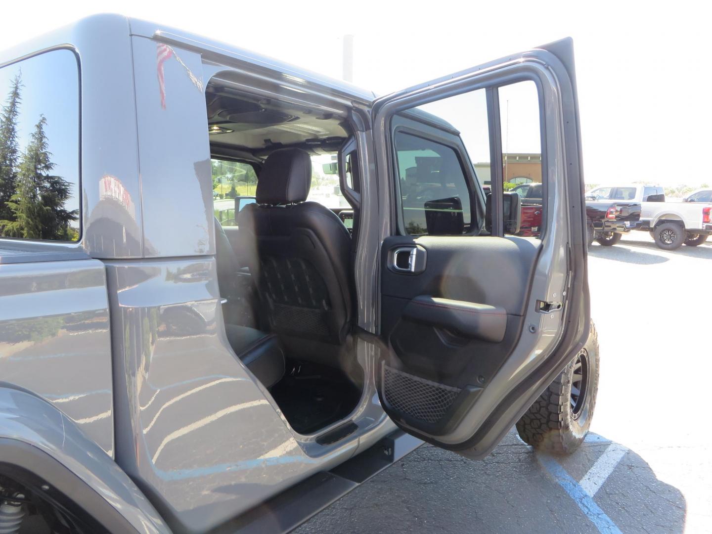 2021 Sting Grey /BLACK Jeep Gladiator Rubicon (1C6JJTBM1ML) with an 3.6L V6 DOHC 24V engine, 6M transmission, located at 2630 Grass Valley Highway, Auburn, CA, 95603, (530) 508-5100, 38.937893, -121.095482 - Features- EVO MFG 4.5" suspension system, 17" Method Race wheels, 37" Toyo AT3 tires, Fabfours running boards, Weathertech bedmat, Bolt on front pre runner bar, and window tint. - Photo#49