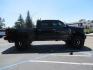 2019 BLACK Ford F-250 SD Platinum Crew Cab Short Bed 4WD (1FT7W2BTXKE) with an 6.7L V8 OHV 16V DIESEL engine, 6A transmission, located at 2630 Grass Valley Highway, Auburn, CA, 95603, (530) 508-5100, 38.937893, -121.095482 - Featuring a 6" Pro Comp Suspension system, Fox shocks and dual steering stabilizers, 38" Falken Wildpeak tires, 20" LRG wheels, Window tint, and painted Ford badges. - Photo#2