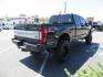 2019 BLACK Ford F-250 SD Platinum Crew Cab Short Bed 4WD (1FT7W2BTXKE) with an 6.7L V8 OHV 16V DIESEL engine, 6A transmission, located at 2630 Grass Valley Highway, Auburn, CA, 95603, (530) 508-5100, 38.937893, -121.095482 - Featuring a 6" Pro Comp Suspension system, Fox shocks and dual steering stabilizers, 38" Falken Wildpeak tires, 20" LRG wheels, Window tint, and painted Ford badges. - Photo#4