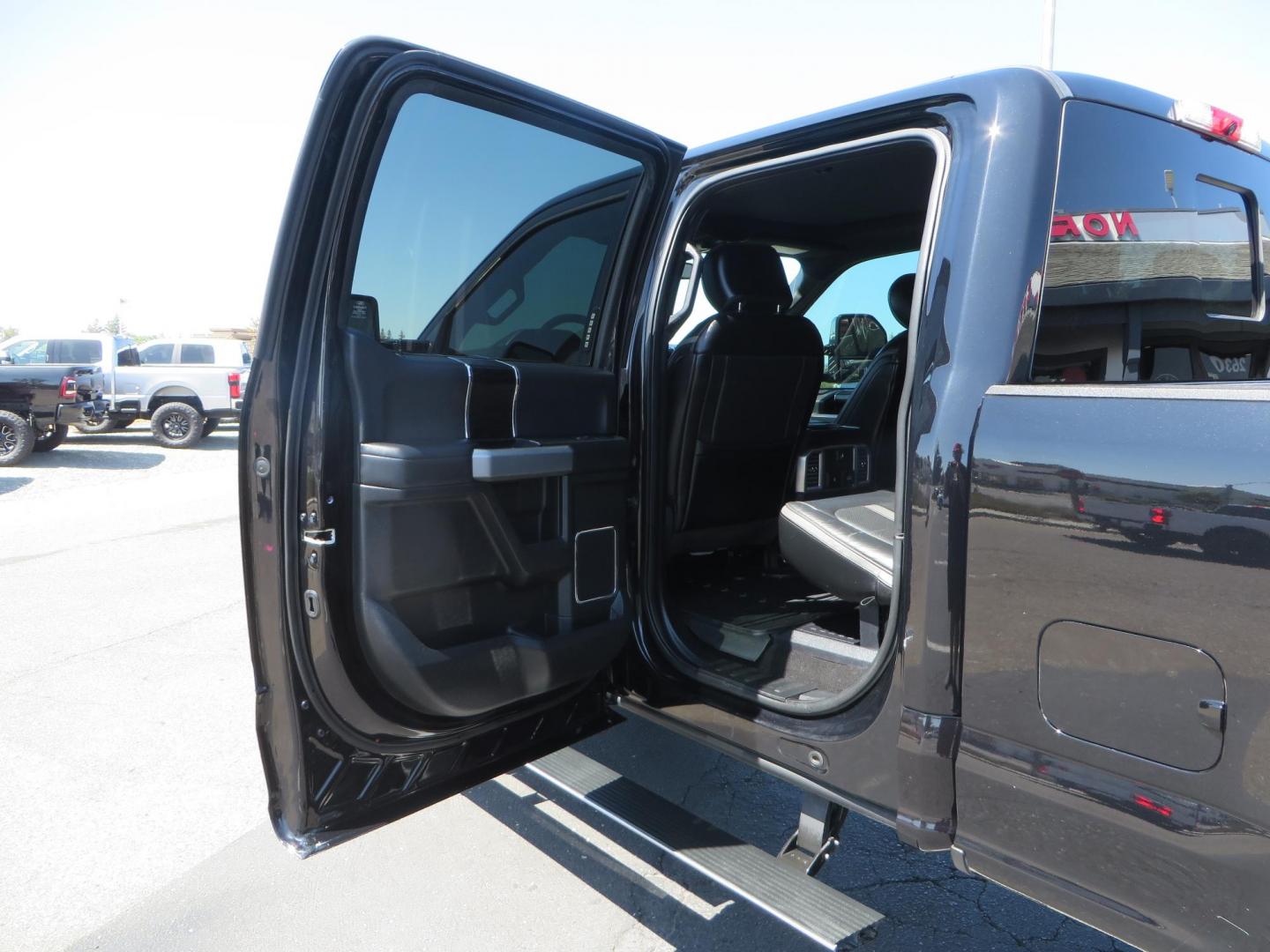 2019 BLACK Ford F-250 SD Platinum Crew Cab Short Bed 4WD (1FT7W2BTXKE) with an 6.7L V8 OHV 16V DIESEL engine, 6A transmission, located at 2630 Grass Valley Highway, Auburn, CA, 95603, (530) 508-5100, 38.937893, -121.095482 - Featuring a 6" Pro Comp Suspension system, Fox shocks and dual steering stabilizers, 38" Falken Wildpeak tires, 20" LRG wheels, Window tint, and painted Ford badges. - Photo#40