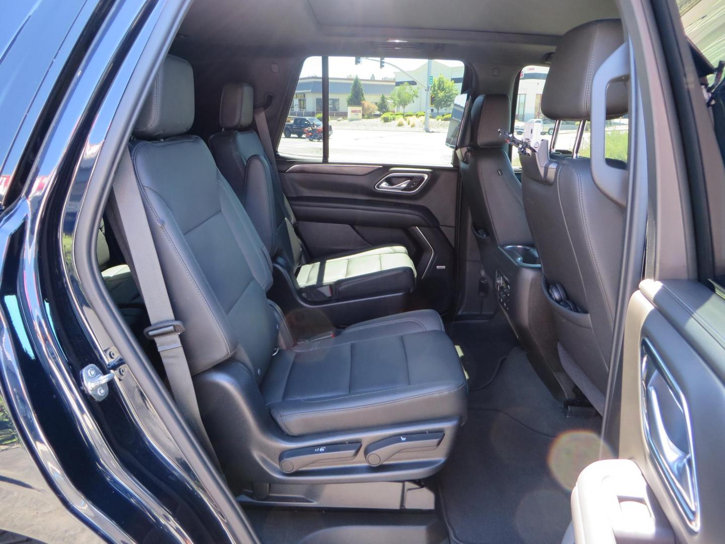 2021 Blue /Black Chevrolet Tahoe Z71 (1GNSKPKD4MR) with an 5.3L V8 OHV 16V engine, automatic transmission, located at 2630 Grass Valley Highway, Auburn, CA, 95603, (530) 508-5100, 38.937893, -121.095482 - Z71 Tahoe with Method Race Wheels, Nitto Ridge Grappler tires, Window tint, and roof mounted crossbars. DVD screen that is missing in pictures has been replaced. - Photo#54