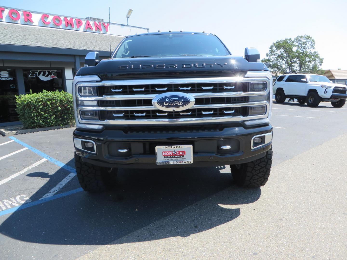 2023 Ford F-350 SD Platinum Crew Cab Short Bed 4WD (1FT8W3BM7PE) with an 6.7L V8 OHV 16V DIESEL engine, 6A transmission, located at 2630 Grass Valley Highway, Auburn, CA, 95603, (530) 508-5100, 38.937893, -121.095482 - Features a BDS 3" radius arm suspension system, Fox 2.0 Shocks, 17" KMC Beadlock wheels with Powdercoated black rings and ARP hardware, 37" Toyo RT trail tires, and a factory slim line bug deflector. - Photo#1