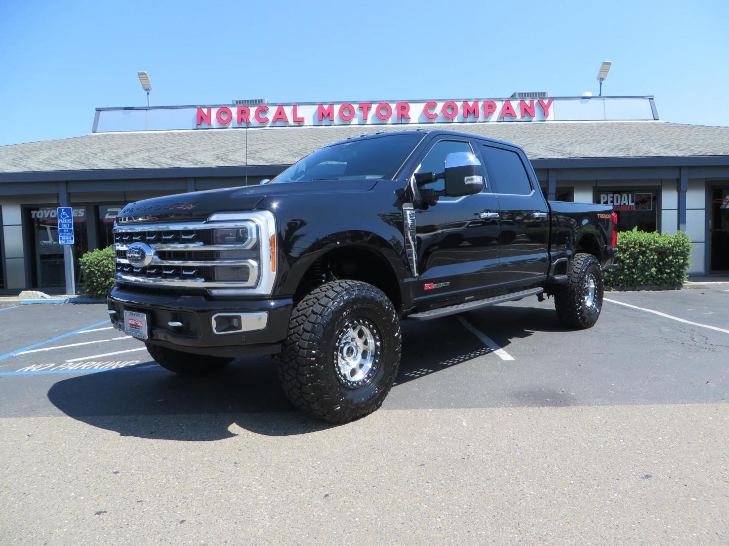 2023 Ford F-350 SD Platinum Crew Cab Short Bed 4WD (1FT8W3BM7PE) with an 6.7L V8 OHV 16V DIESEL engine, 6A transmission, located at 2630 Grass Valley Highway, Auburn, CA, 95603, (530) 508-5100, 38.937893, -121.095482 - Features a BDS 3" radius arm suspension system, Fox 2.0 Shocks, 17" KMC Beadlock wheels with Powdercoated black rings and ARP hardware, 37" Toyo RT trail tires, and a factory slim line bug deflector. - Photo#0