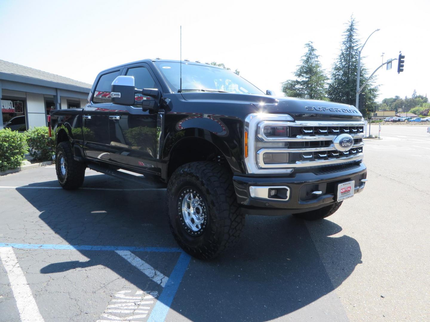 2023 Ford F-350 SD Platinum Crew Cab Short Bed 4WD (1FT8W3BM7PE) with an 6.7L V8 OHV 16V DIESEL engine, 6A transmission, located at 2630 Grass Valley Highway, Auburn, CA, 95603, (530) 508-5100, 38.937893, -121.095482 - Features a BDS 3" radius arm suspension system, Fox 2.0 Shocks, 17" KMC Beadlock wheels with Powdercoated black rings and ARP hardware, 37" Toyo RT trail tires, and a factory slim line bug deflector. - Photo#2