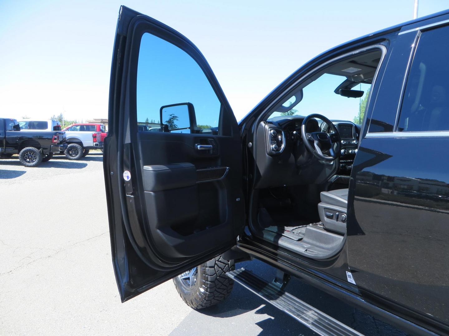 2023 /BLACK GMC Sierra 2500HD Denali Crew Cab 4WD SB (1GT49REY5PF) with an 6.6L V8 OHV 16V TURBO DIESEL engine, 6A transmission, located at 2630 Grass Valley Highway, Auburn, CA, 95603, (530) 508-5100, 38.937893, -121.095482 - Denali 2500 sitting on a BDS 5" suspension system, Upper control arms, Fox shocks, 20" 4 Play wheels, 37" Nitto Ridge Grappler tires, window tint, and weathertech floor liners. - Photo#16